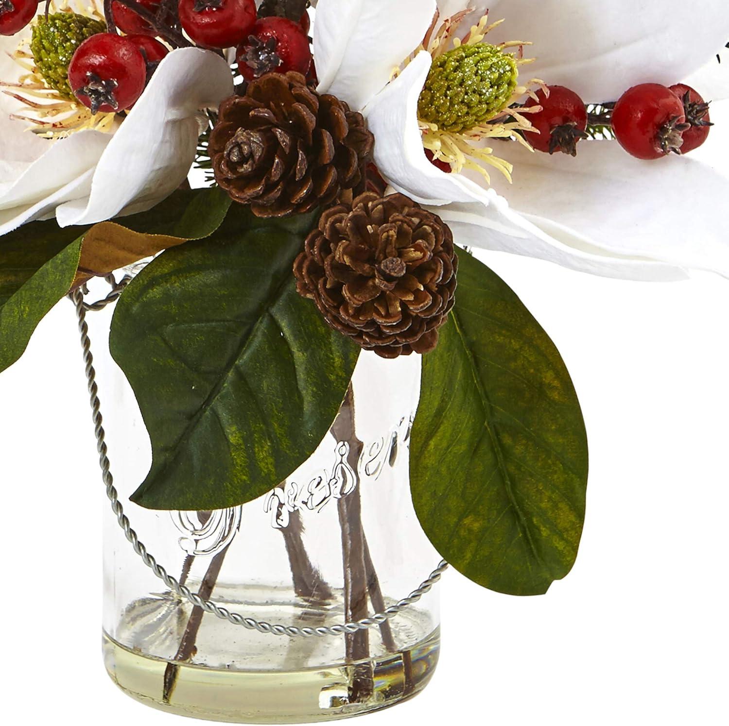 Winter Magnolia, Pine, and Berry Arrangement in Glass Vase