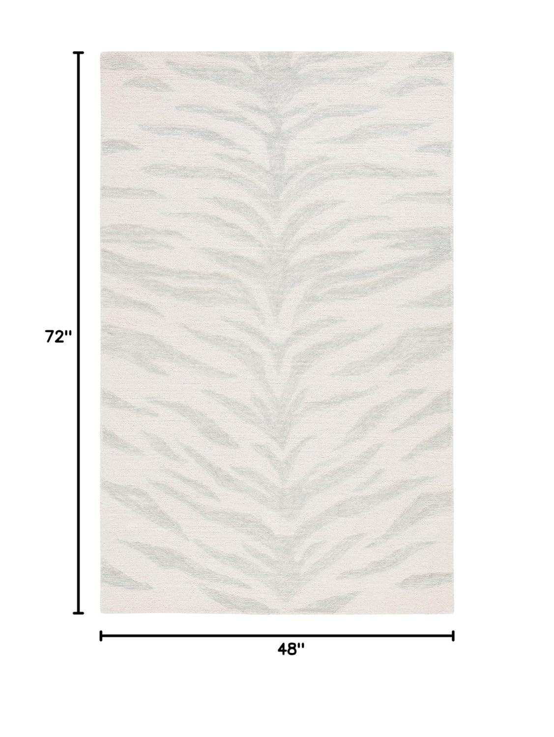 Handmade Tufted Pink/Ivory Wool 4' x 6' Rectangular Rug