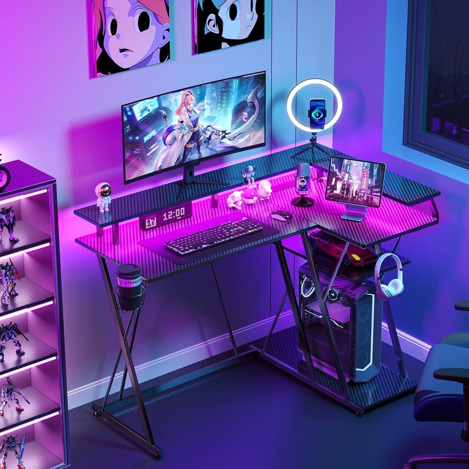 Black L-Shaped Gaming Desk with LED Lights, Power Outlet, and Storage