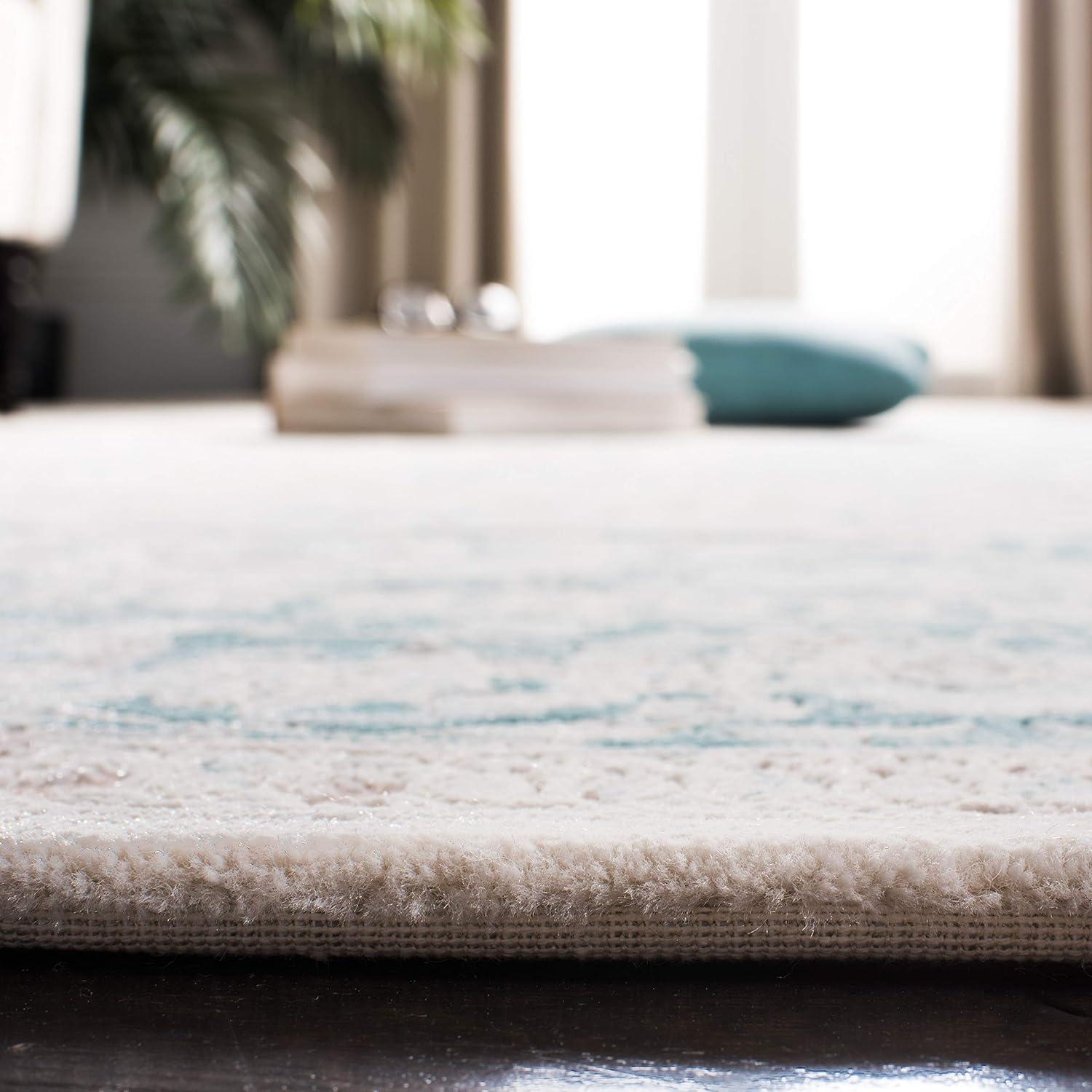 Ivory and Turquoise Rectangular Reversible Synthetic Area Rug