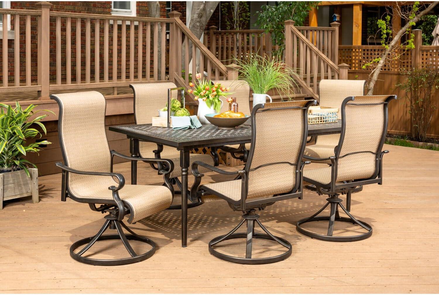 Hanover Brigantine Juego de Comedor Moderno para Exteriores de 7 Piezas / 4 Sillas con Cabestrillo, 2 Balancines Giratorios / Mesa con Tapa de 40'' x 70'' / Clima, Xido, Resistente a UV / Bronceado / BRIGDN7PCSW-2