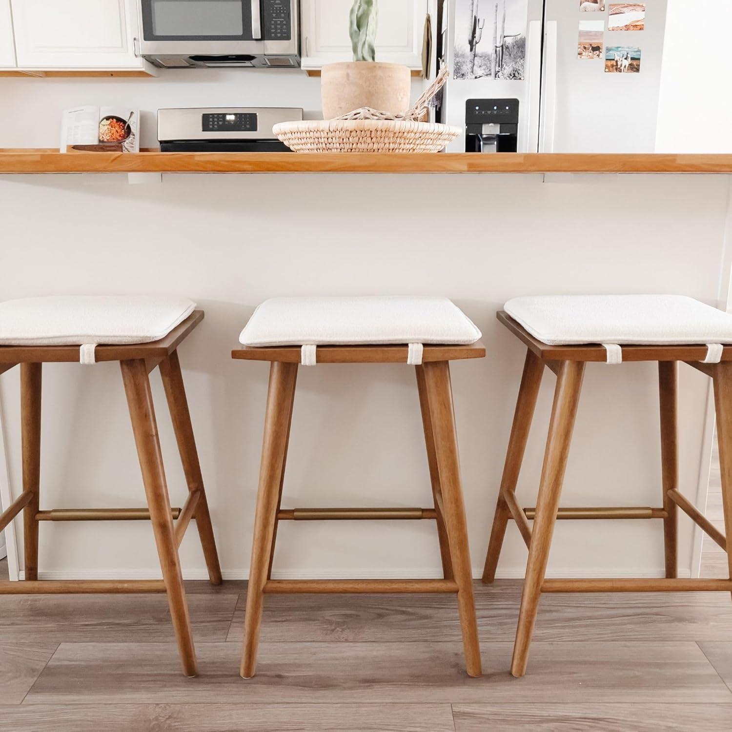 Nathan James Barker Counter Height Barstool: Padded Saddle Seat, Solid Rubberwood Legs, 24" Tall