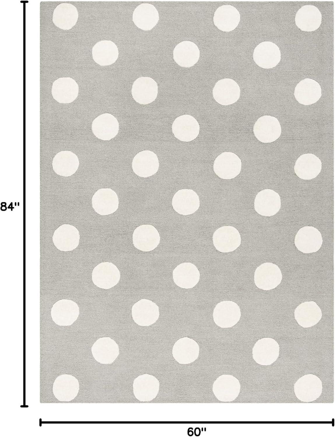 Safavieh Kids Polka Dots SFK904 Hand Tufted Indoor Area Rug - Ivory/Black - 5'x7' - Safavieh