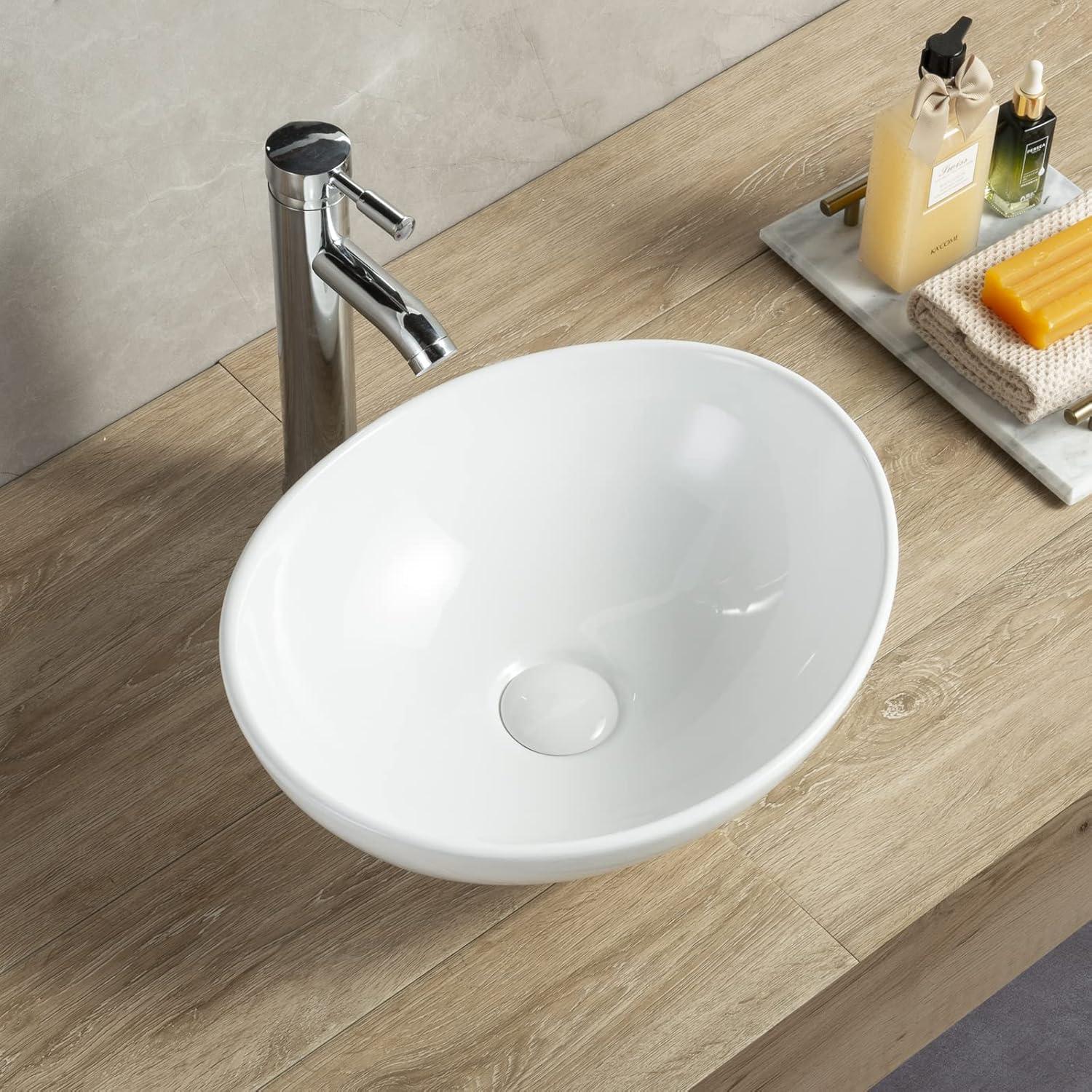 Bathivy Oval Vessel Sink, 14.6'' x 11.6'' Modern Above Counter Oval Bathroom Sink, Small White Porcelain Bathroom Vessel Sink with Pop Up Drain