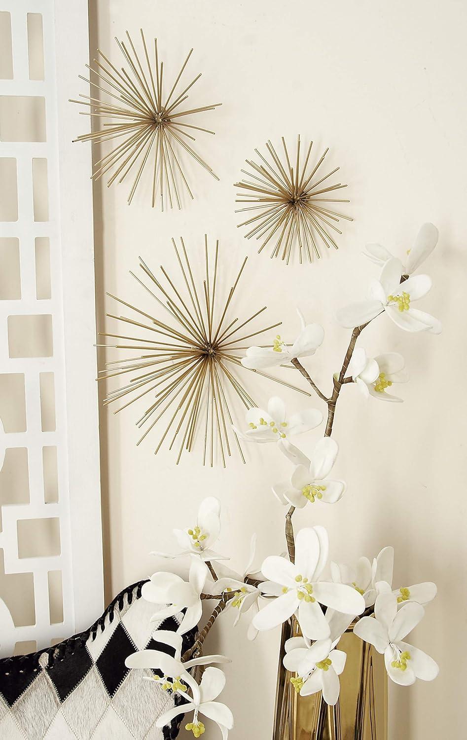 CosmoLiving by Cosmopolitan Gold Metal Starburst 3D Short Spike Home Wall Decor, Set of 3 6", 9", 12"W