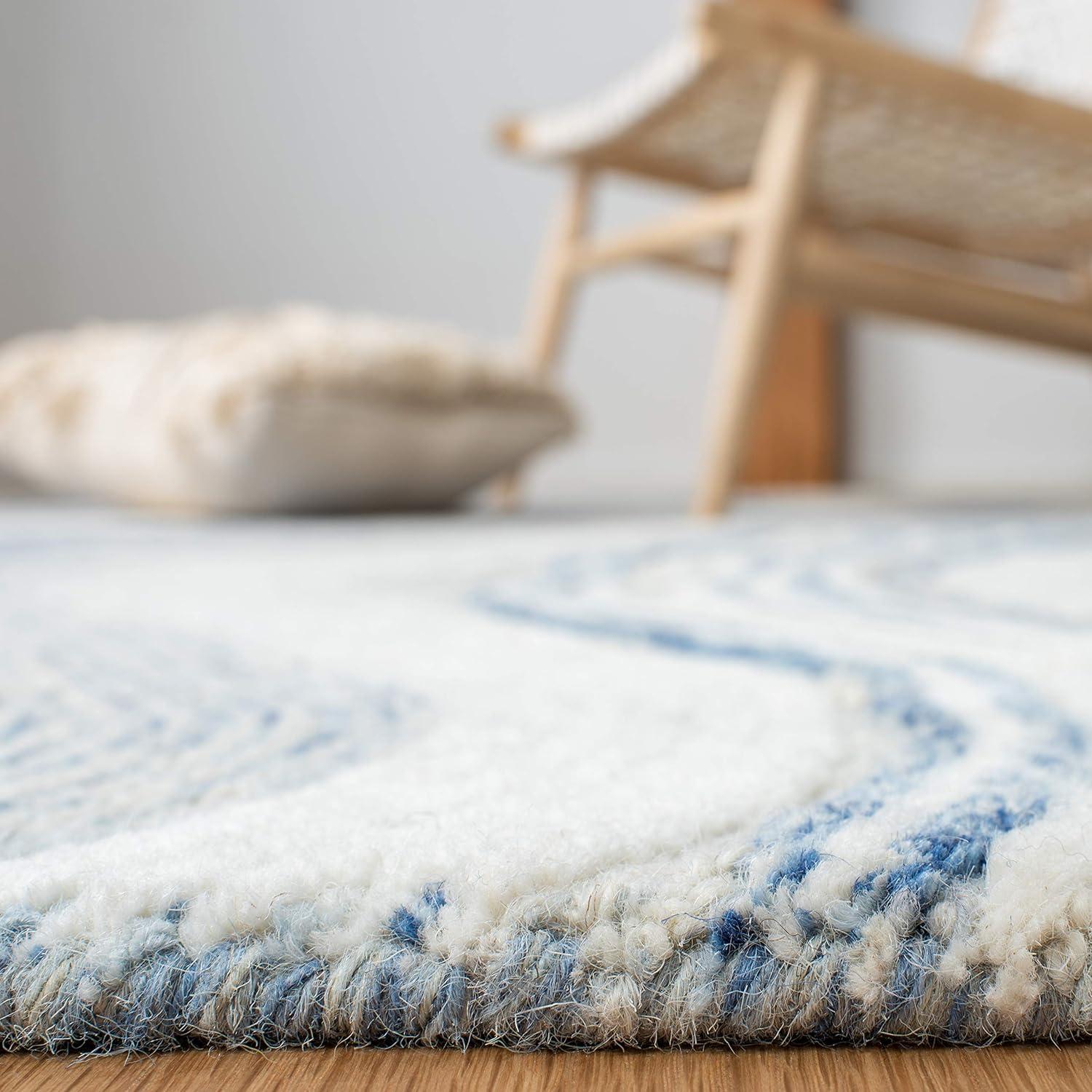 Round Blue and Ivory Tufted Wool Area Rug