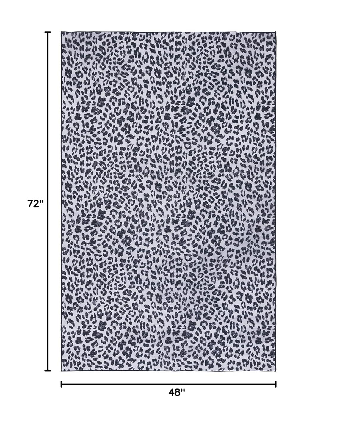 Everly Quinn Faux Hide Performance Machine Washable Animal Print Rug