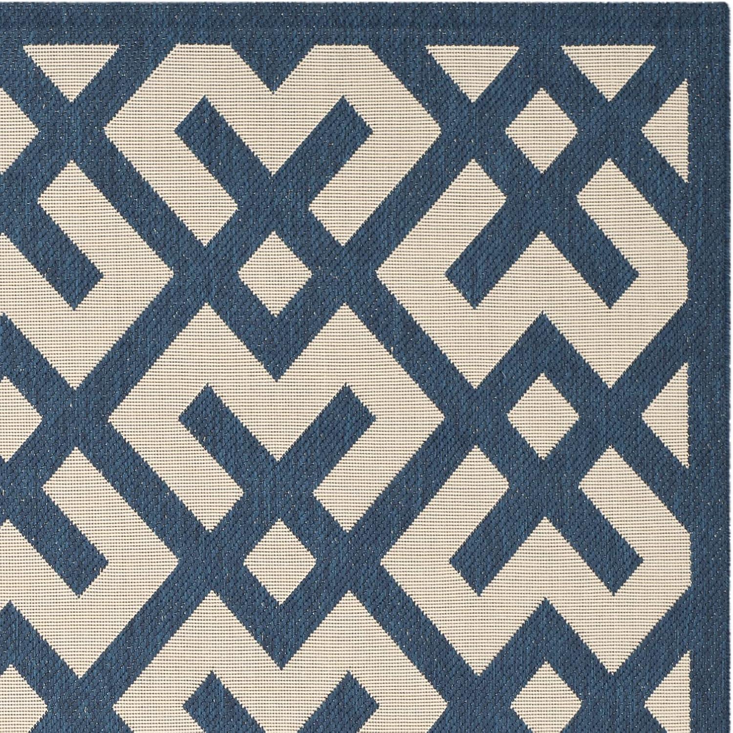 Navy and Beige 5' x 7' Reversible Flat Woven Synthetic Area Rug