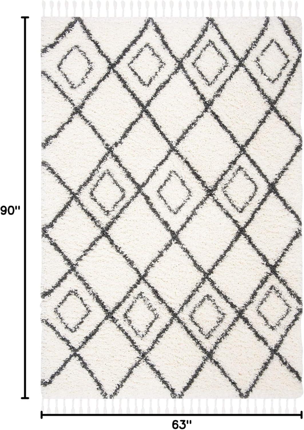 SAFAVIEH Moroccan Tassel Shag Comhgham Geometric Area Rug, Ivory/Dark Grey, 5'3" x 7'6"