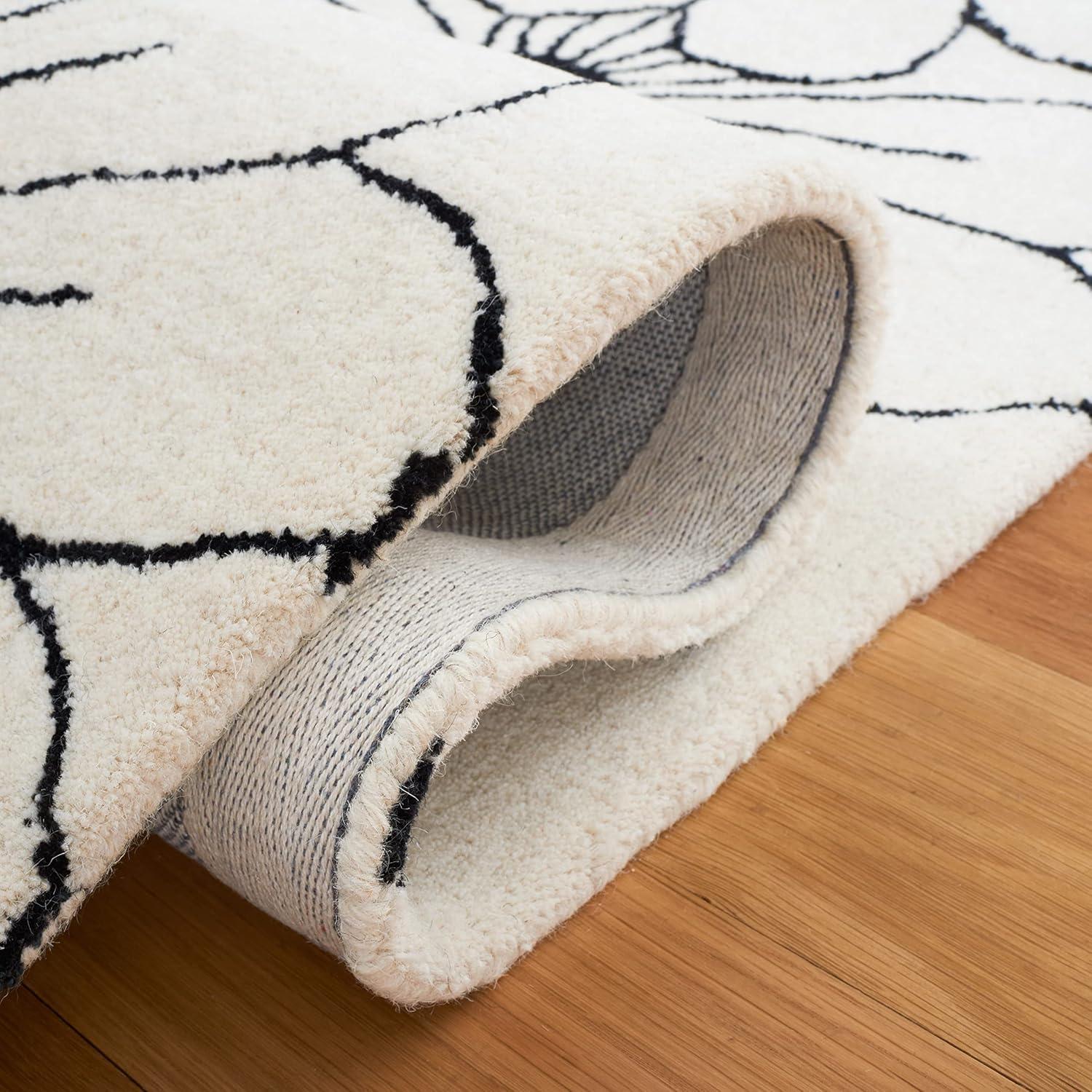 Ivory and Black Handmade Wool and Viscose Floral Rug