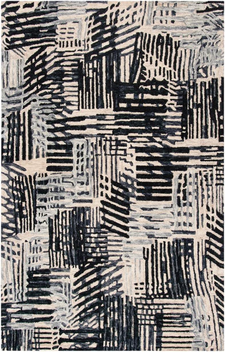 Handmade Black and Ivory Wool Abstract 4' x 6' Rug