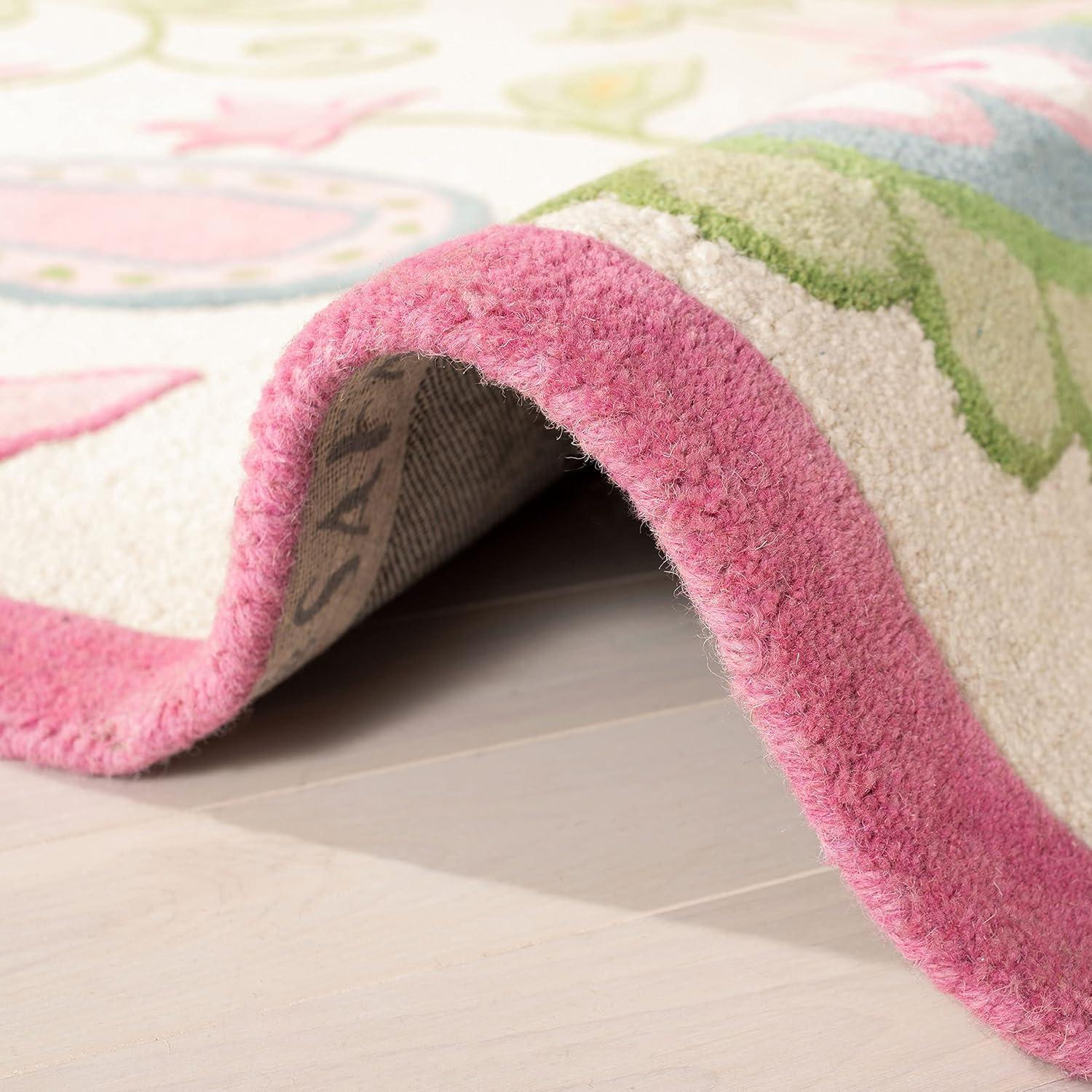 SAFAVIEH Kids Collection SFK351A Handmade Ivory/Pink Rug
