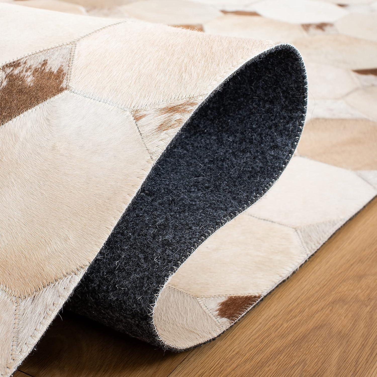 Loon Peak® Bersa Flat Weave Hair On Leather Geometric Rug