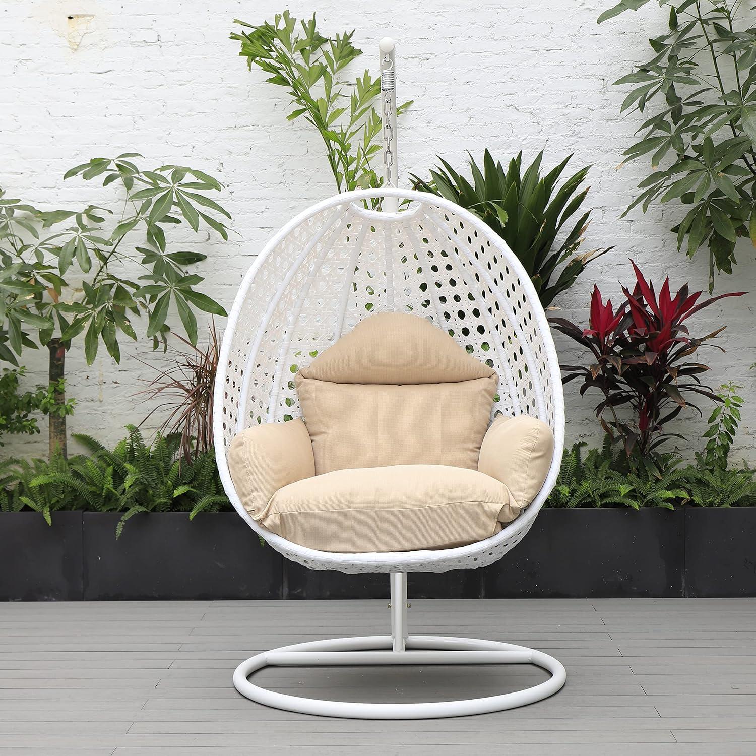 LeisureMod White Wicker Indoor Outdoor Bedroom Patio Hanging Egg Swing Chair with Stand and Cushion Beige
