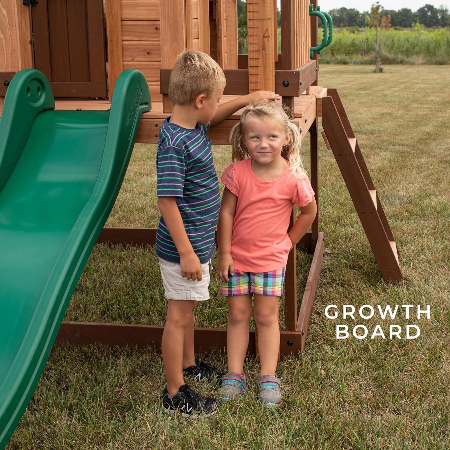 Backyard Discovery Echo Heights Cedar Wooden Elevated Kids Playhouse with Wave Slide, Play Kitchen, and Deck & Reviews | Wayfair