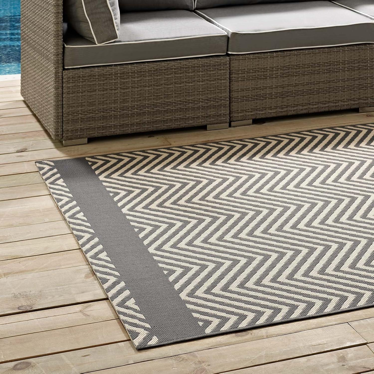 Gray and Beige 5' x 8' Synthetic Geometric Area Rug