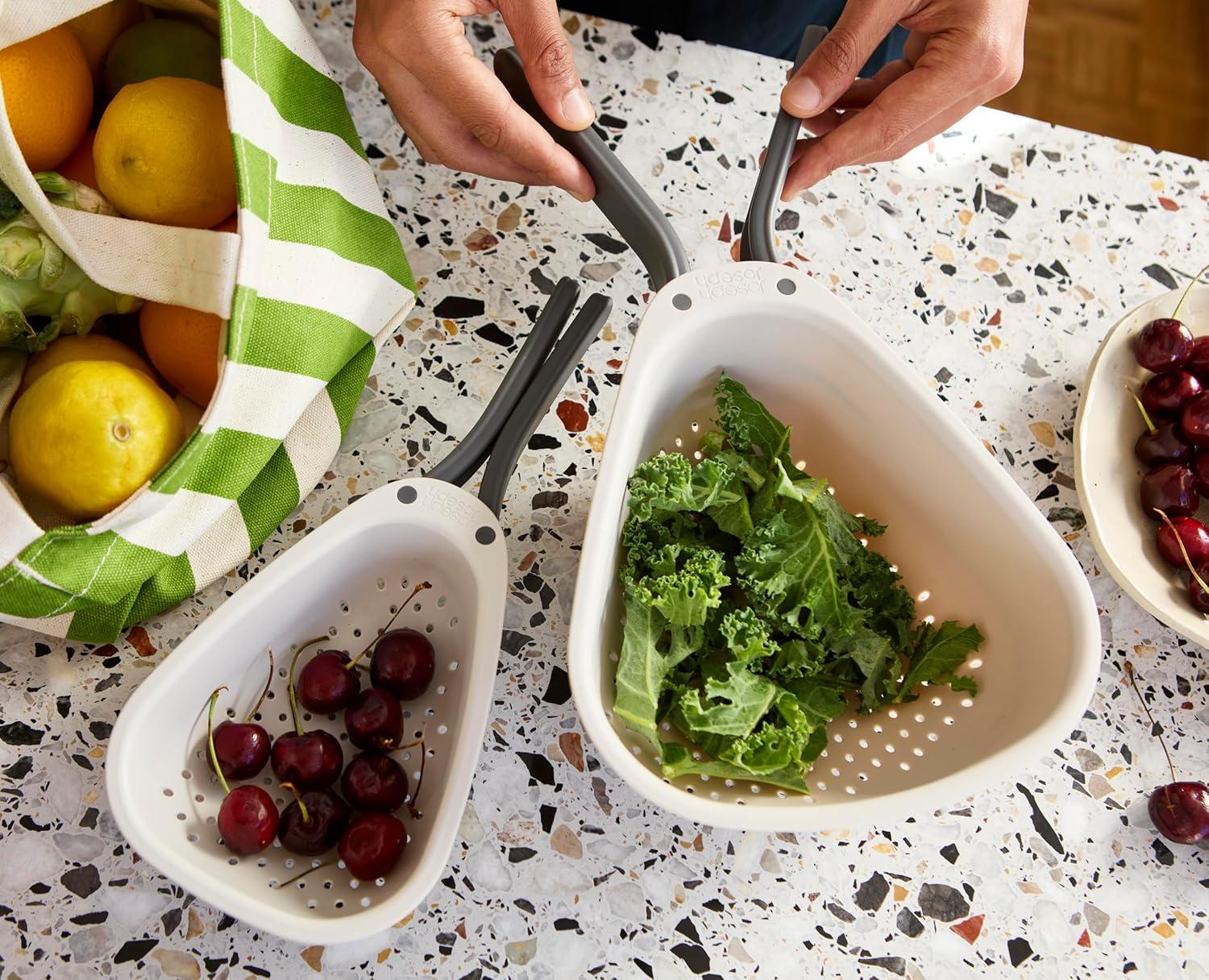 Joseph Joseph Droplet Compact Colander with Folding Handles, Space-Saving Design, Easy-Pour Corners, for Draining Vegetables, Pasta, Fruits