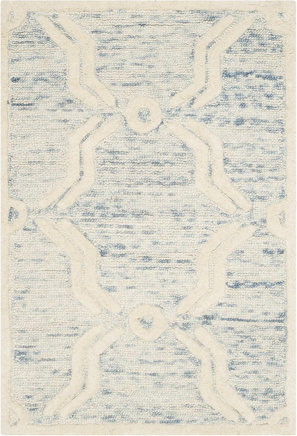 SAFAVIEH Cambridge Leland Faded Geometric Wool Area Rug, Light Blue/Ivory, 2' x 3'