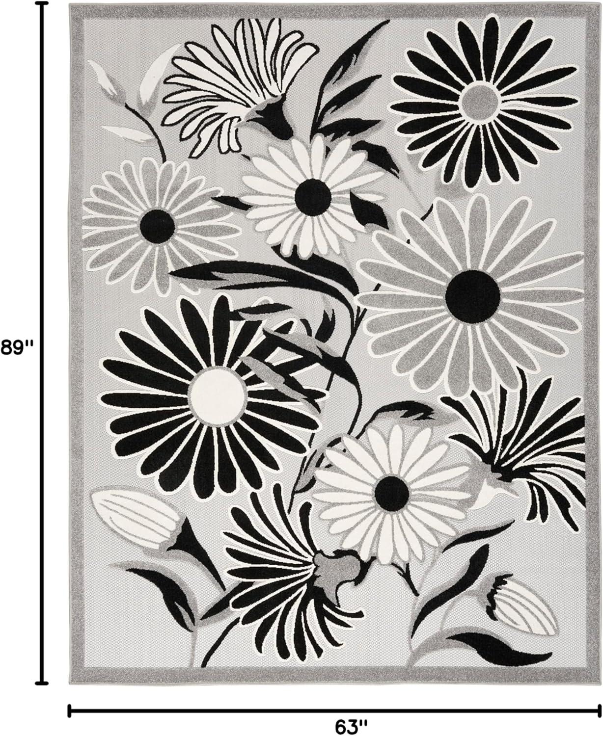 Aloha Daisy Black and White 5'3" x 7'5" Synthetic Outdoor Rug