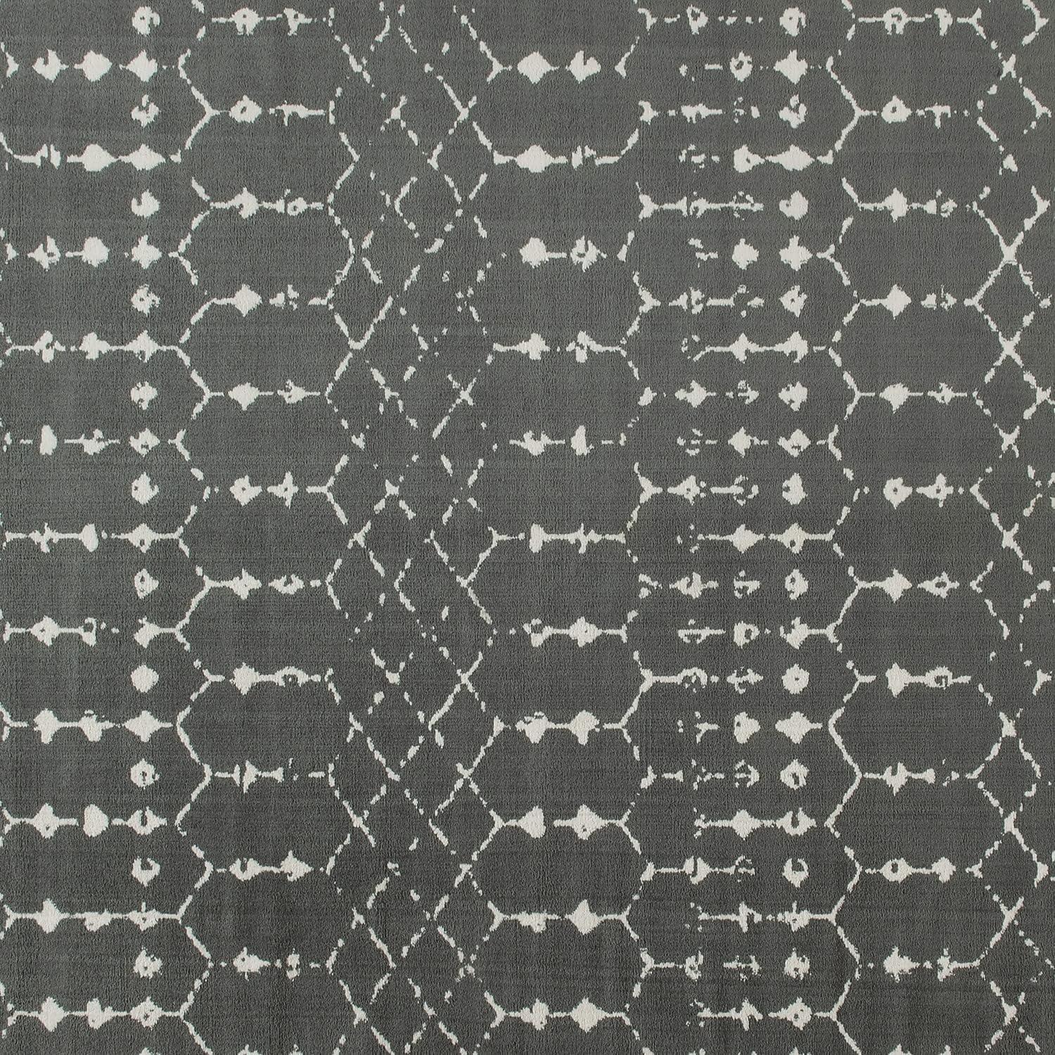 Bohemian Geometric 8' x 10' Dark Gray and Ivory Synthetic Rug