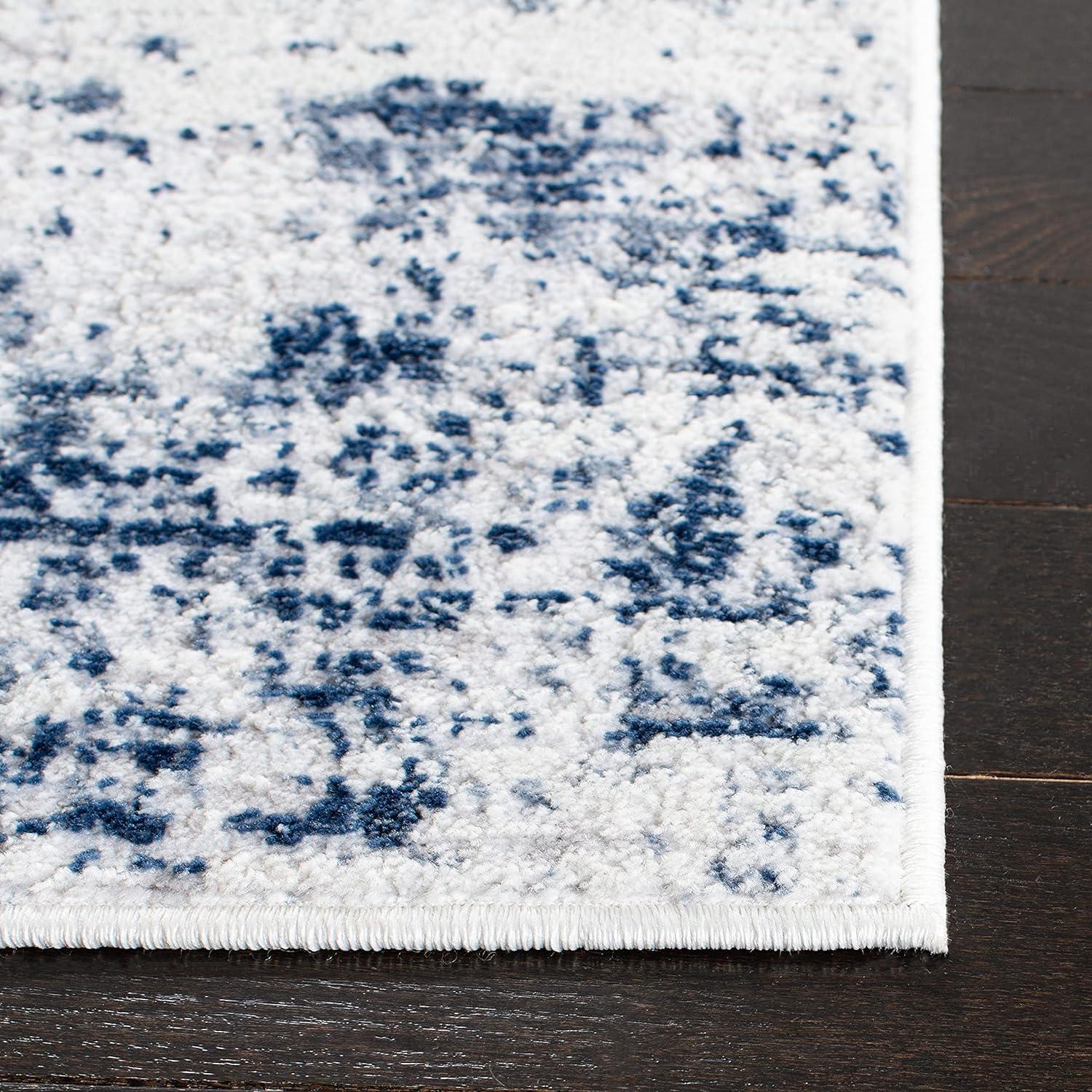 Ivory and Navy Abstract Reversible Square Synthetic Rug