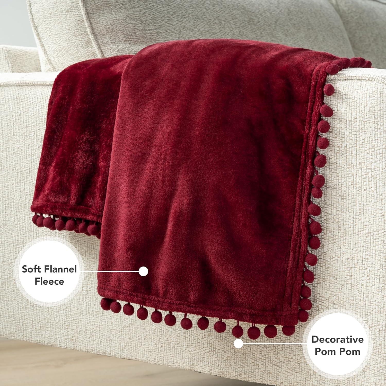 PAVILIA Fleece Throw Blanket for Couch with Pom Pom Fringe, Maroon Burgundy Red, Soft Cozy Fuzzy Flannel Blanket for Sofa Bed, Lightweight Plush All Season Throw, 50x60 Inches