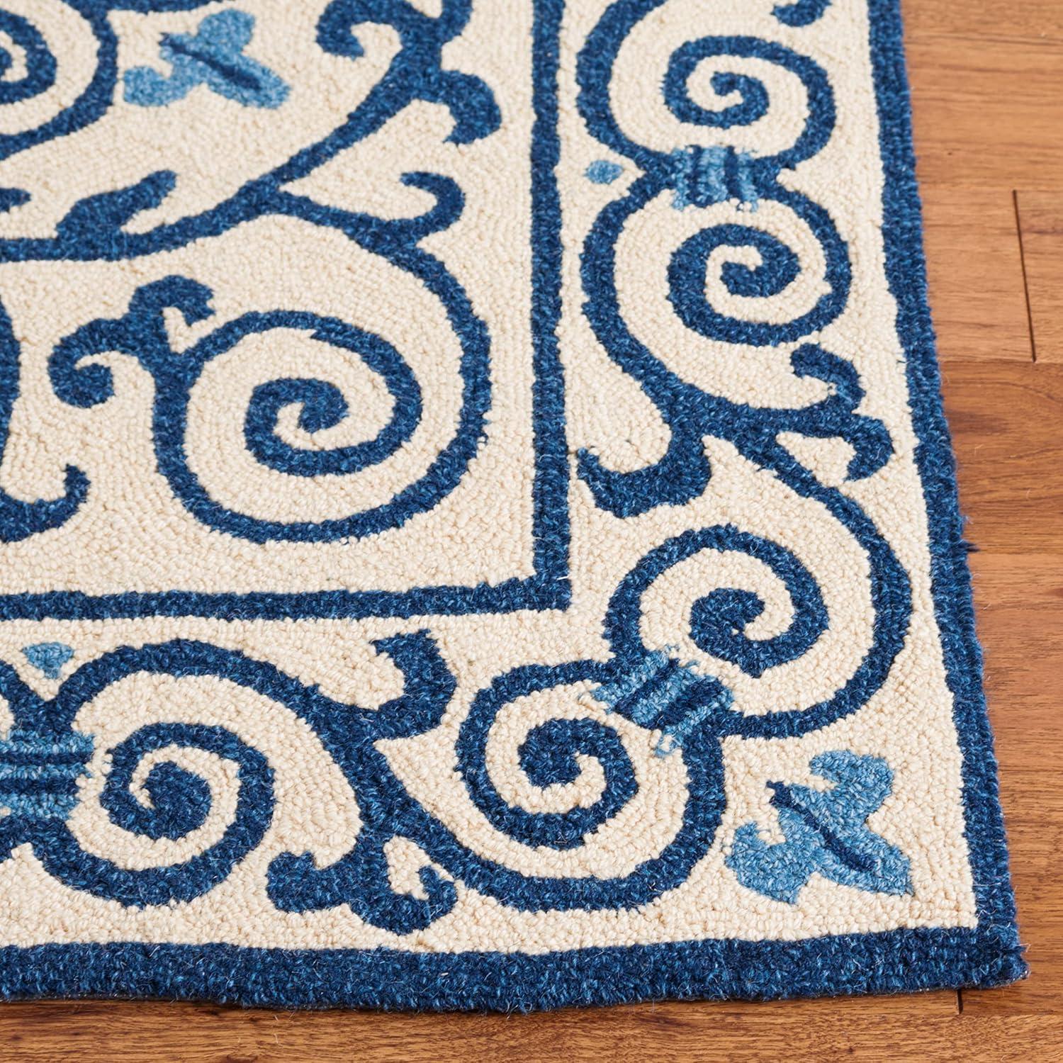 SAFAVIEH Chelsea Aragon Geometric Borders Wool Area Rug, Ivory/Dark Blue, 1'8" x 2'6"