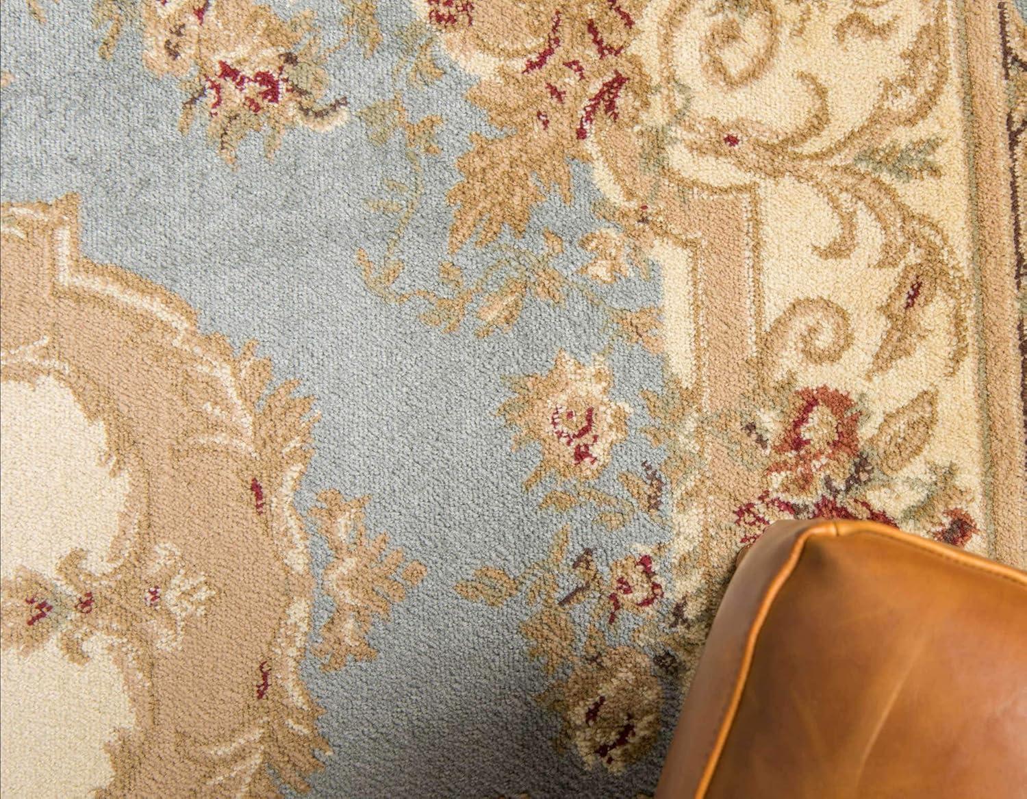 Light Blue and Beige Medallion Synthetic 4' x 6' Area Rug