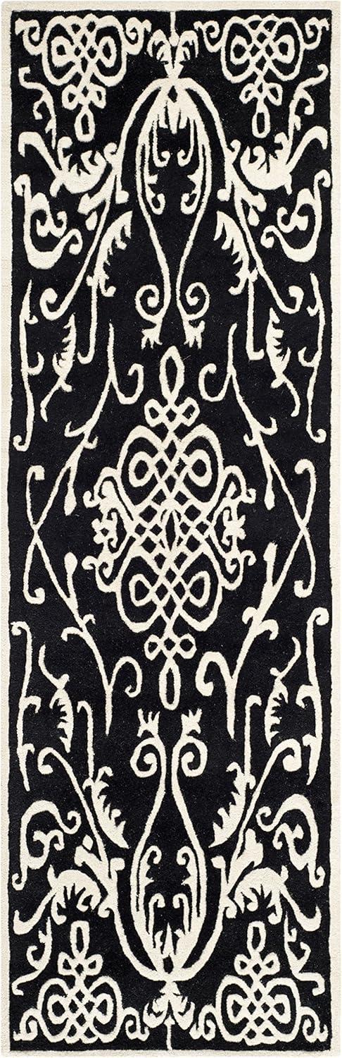 Soho SOH120 Hand Tufted Area Rug - Black/Ivory - 5'x8' - Safavieh.