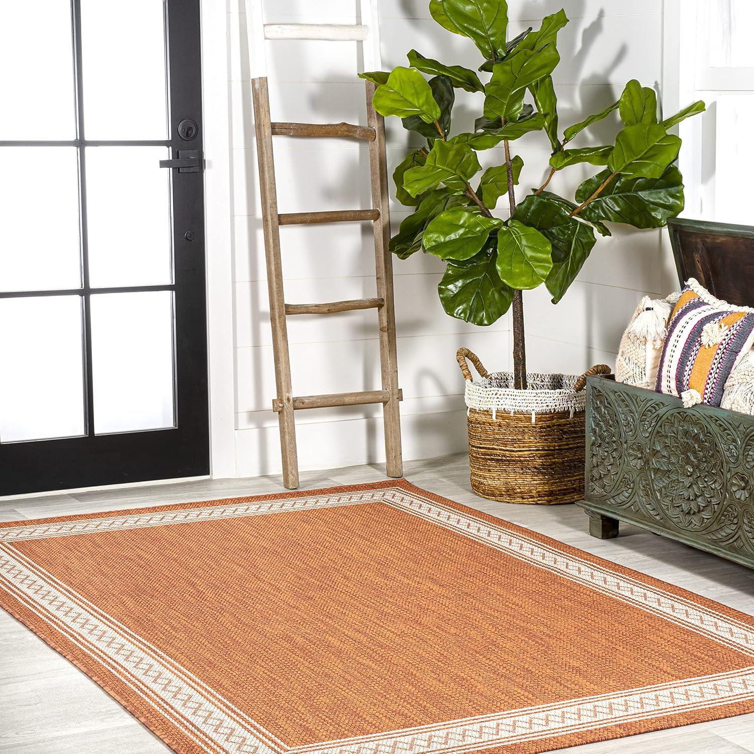 Lucia Cream and Orange Synthetic Indoor/Outdoor Area Rug