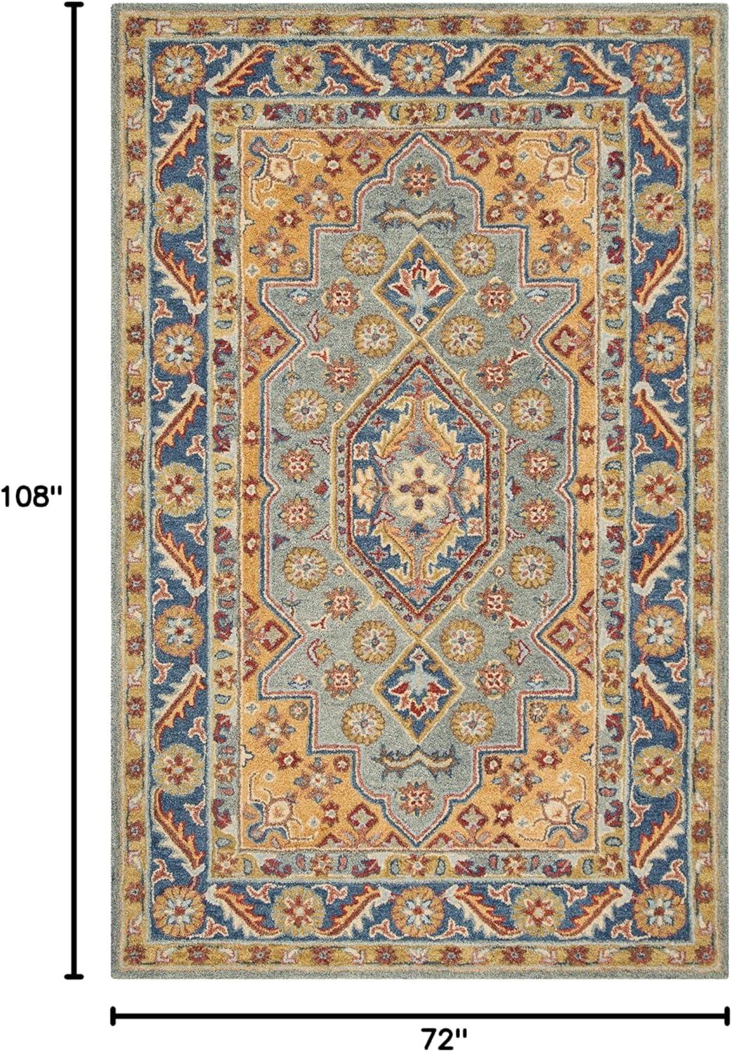 Antiquity AT504 Hand Tufted Area Rug - Blue/Gold - 6'x9' - Safavieh.