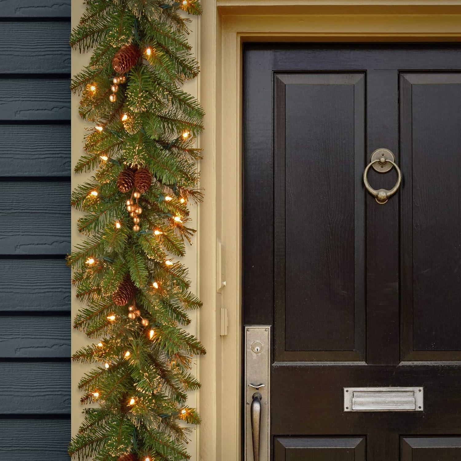 National Tree Company 9ft. Glittery Gold Pine Garland with Clear Lights