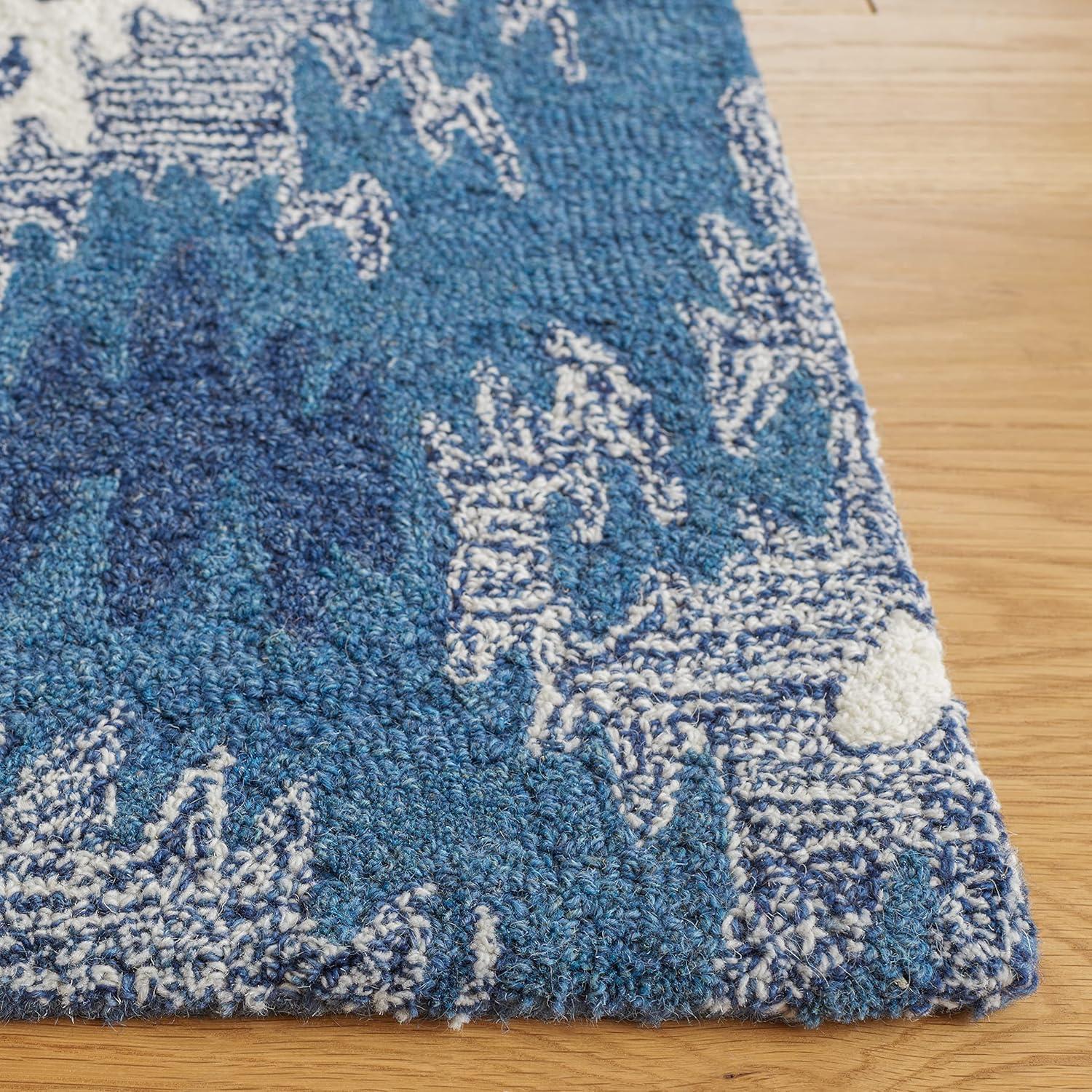 Ikat IKT652 Hand Tufted Area Rug - Blue/Ivory - 8'x10' - Safavieh.