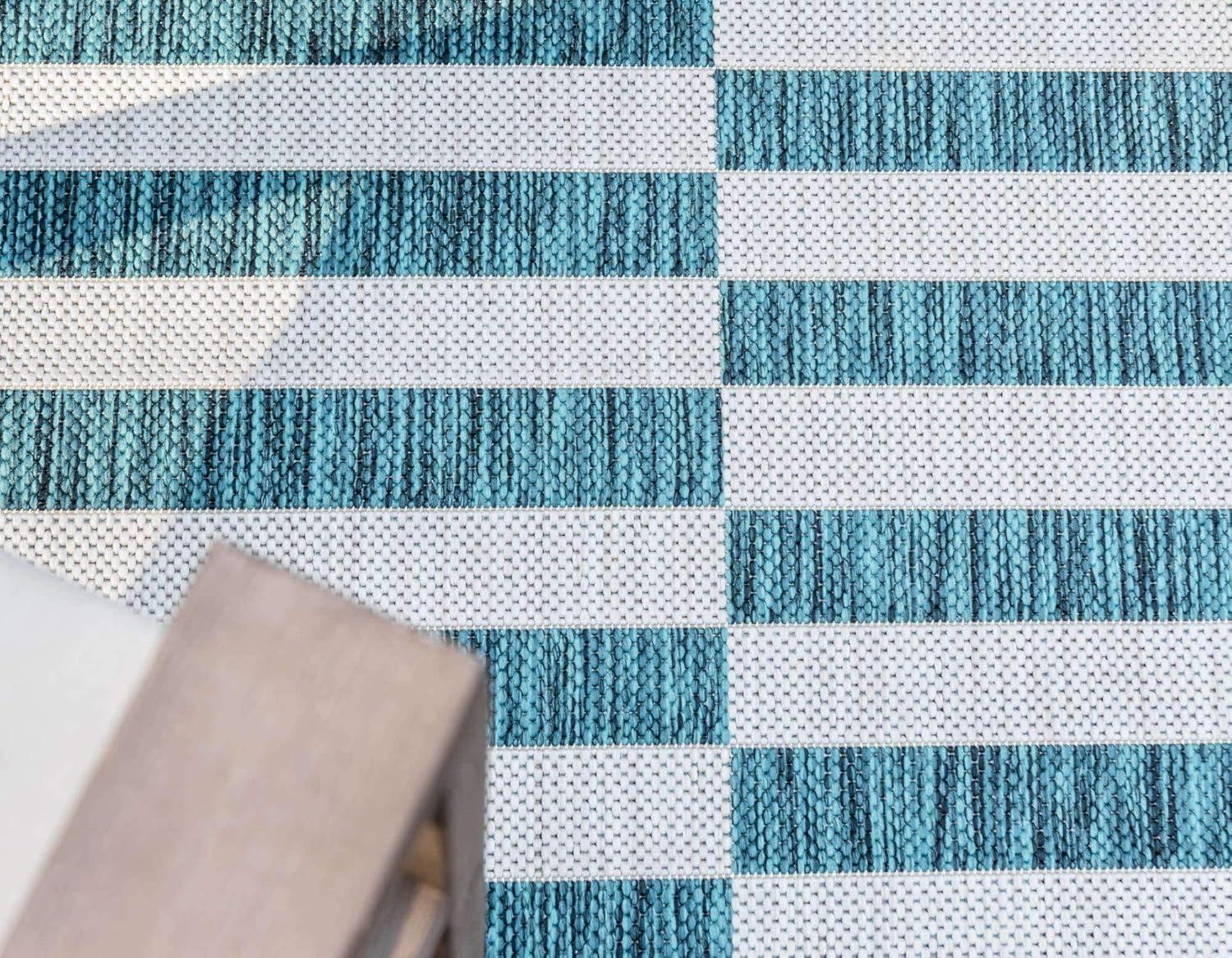 Teal and Ivory Stripe Easy-Care Outdoor Rug 5'1" x 8' Rectangular Synthetic