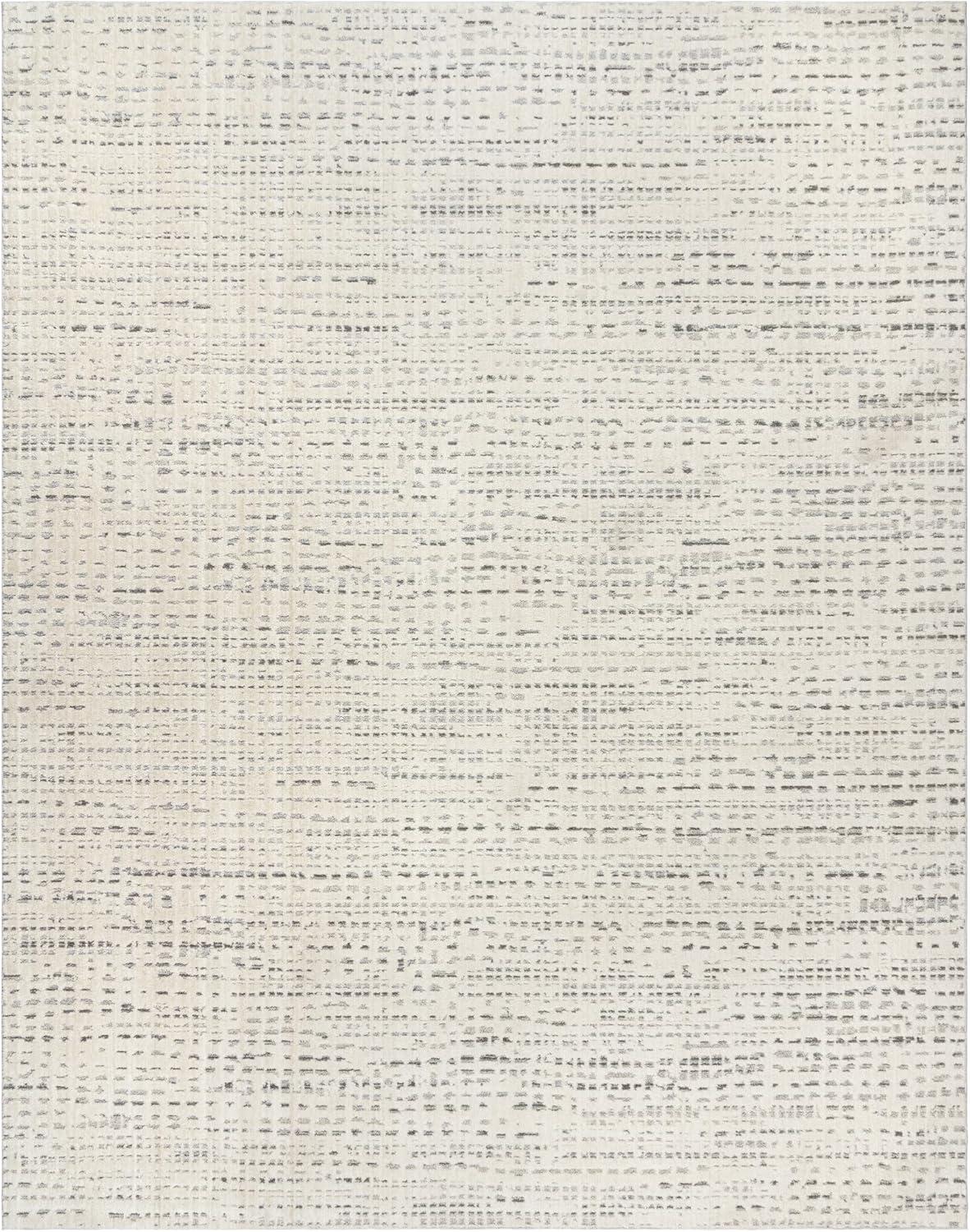 Ivory and Gray Tufted Polka Dot 5' x 7' Synthetic Rug