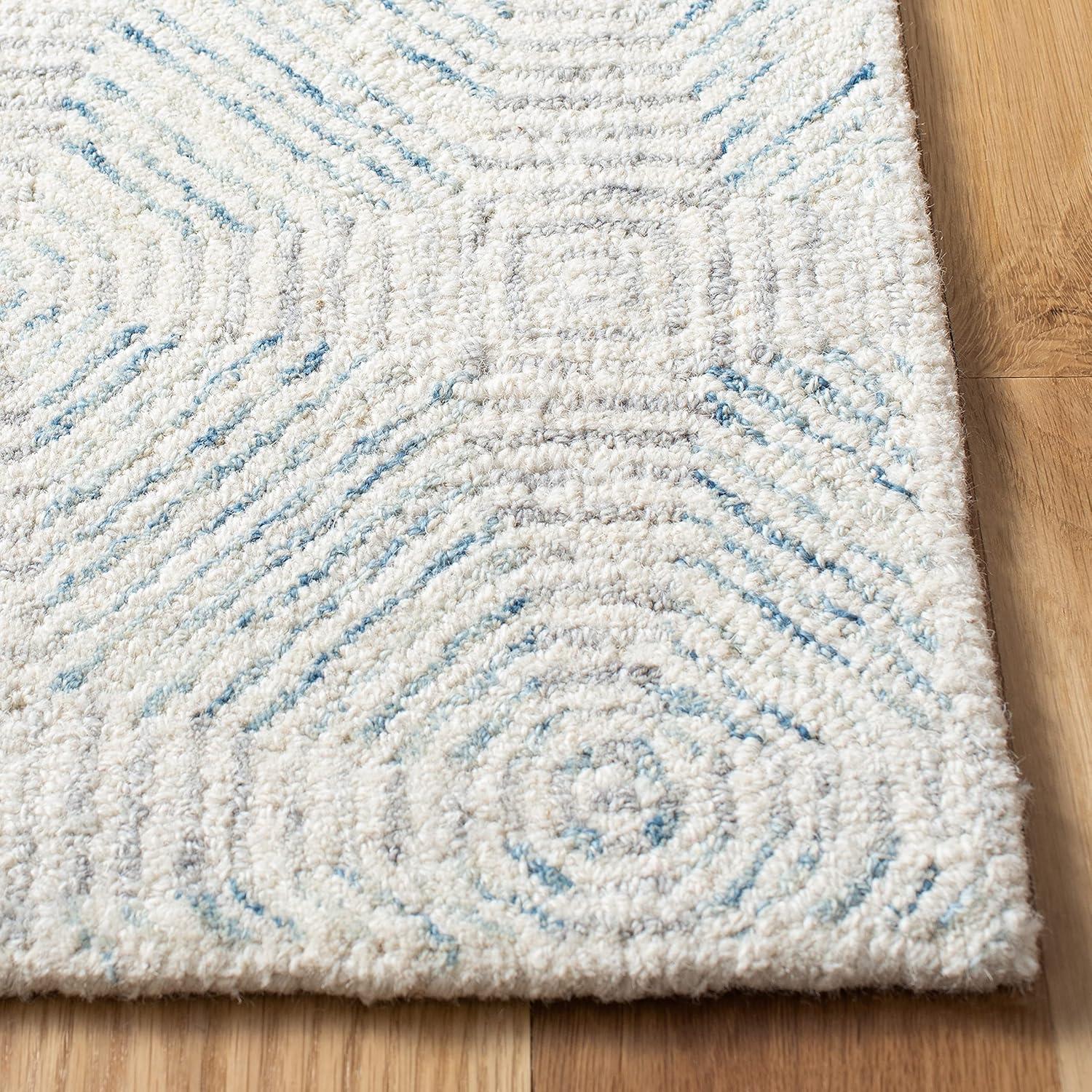 Abstract ABT654 Hand Tufted Area Rug - Ivory/Light Blue - 8'x10' - Safavieh.