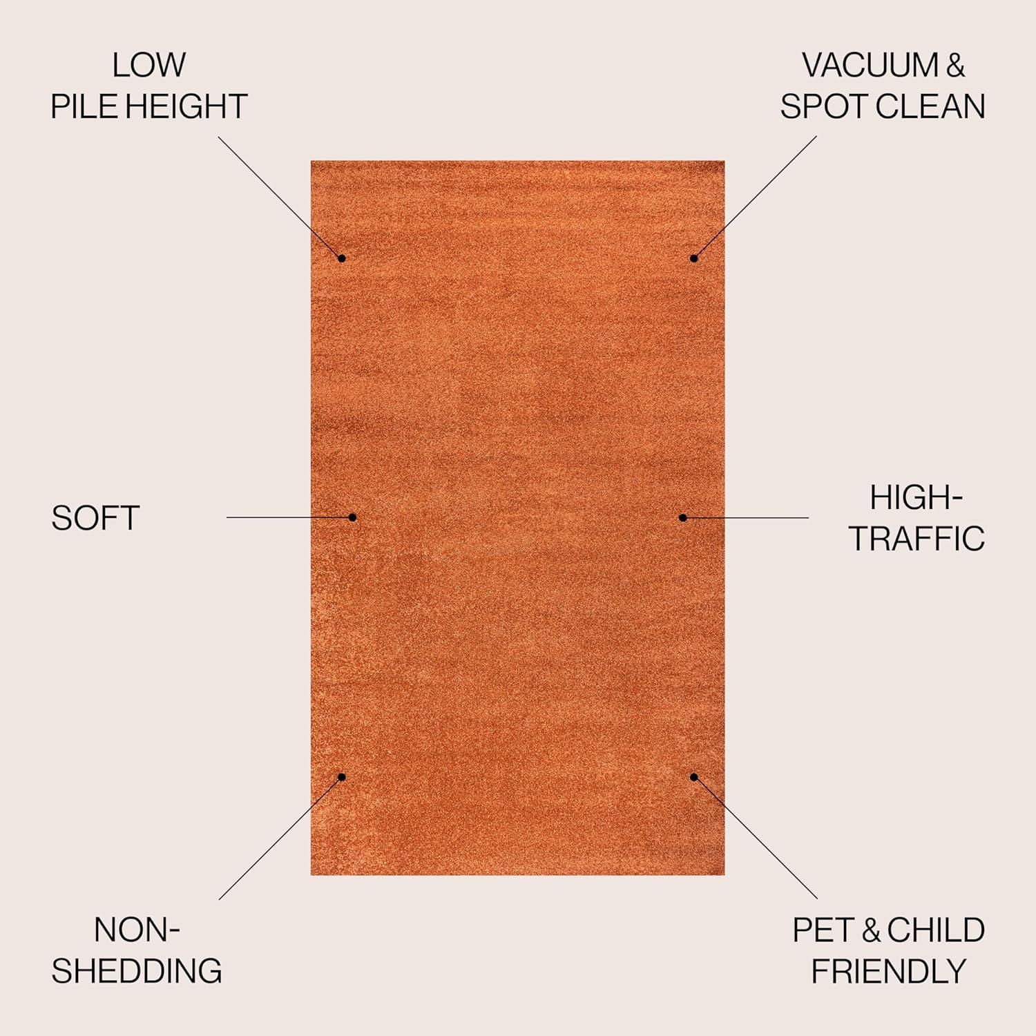 Haze Solid Low-Pile Orange 10 ft. x 14 ft. Area rug -JONATHAN Y