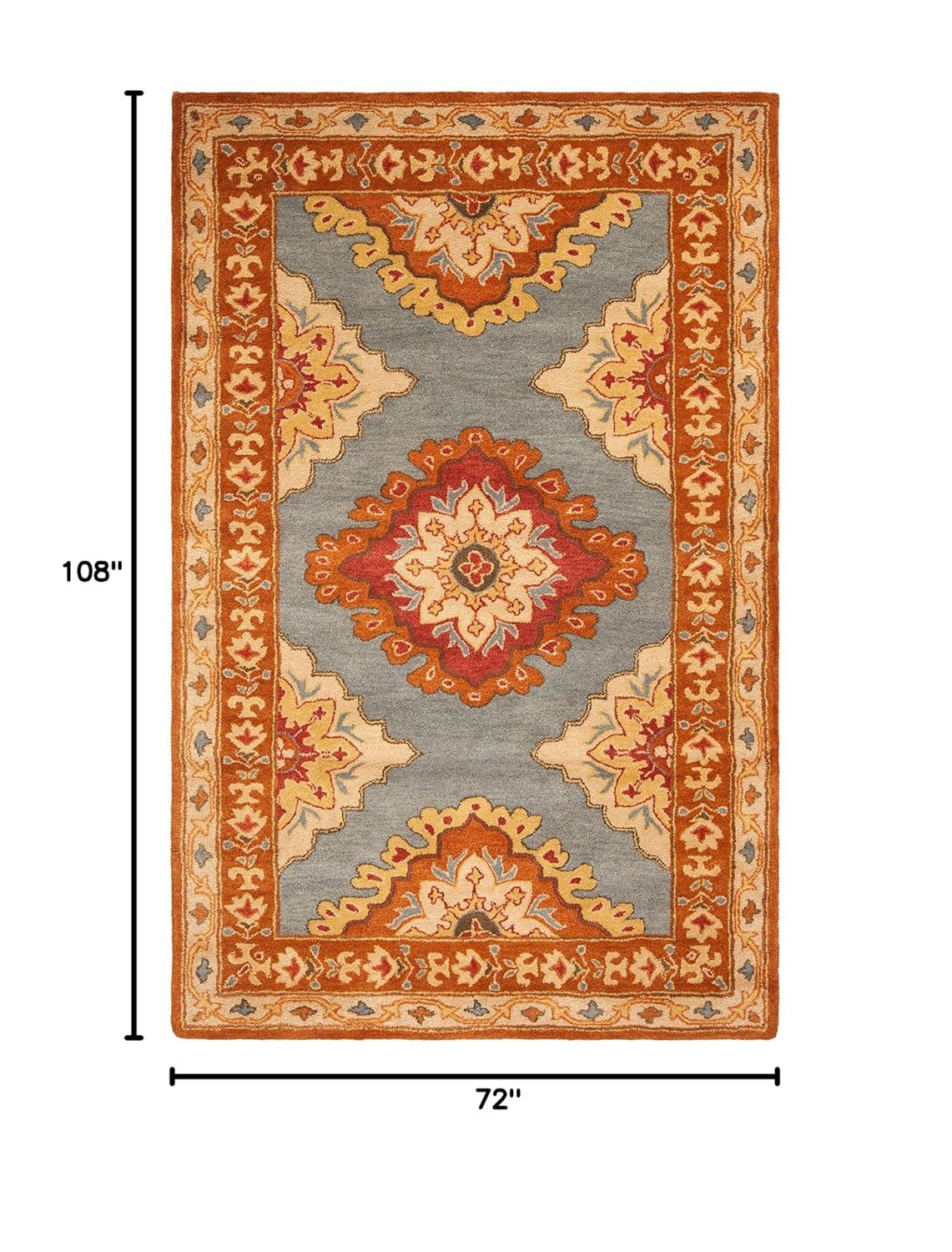 SAFAVIEH Heritage Lewis Traditional Wool Area Rug, Blue/Rust, 6' x 9'