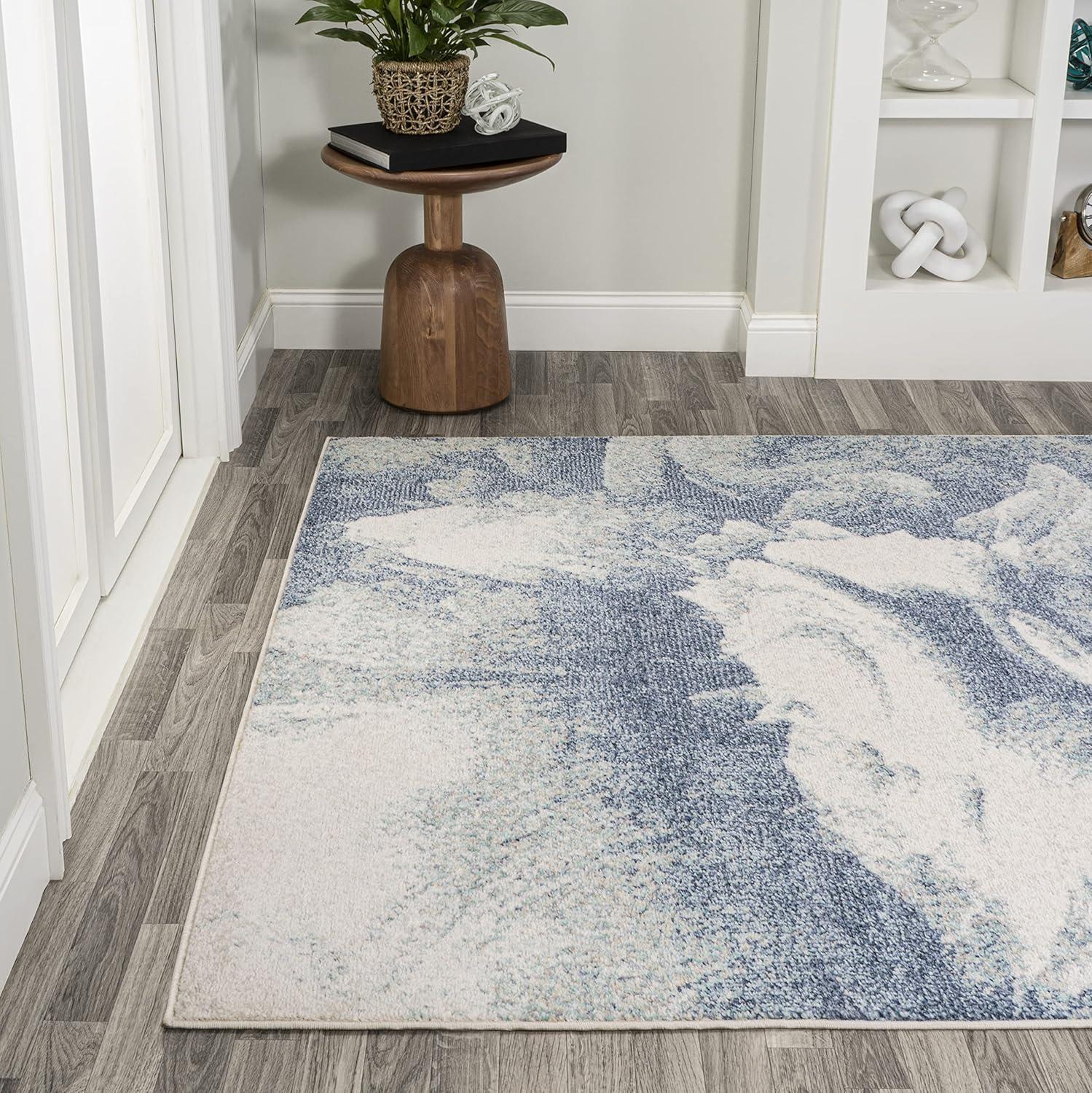 Blue and Cream Abstract Synthetic 8' x 10' Reversible Area Rug