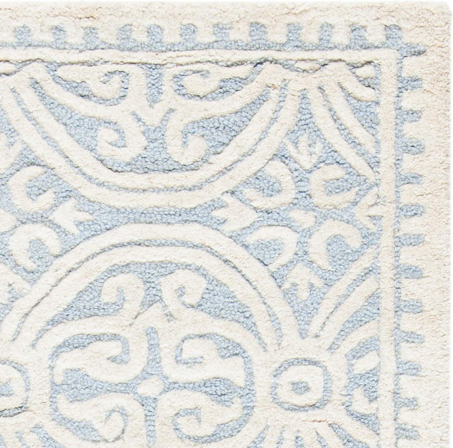 SAFAVIEH Cambridge Leslie Geometric Wool Area Rug, Light Blue/Ivory, 11' x 15'