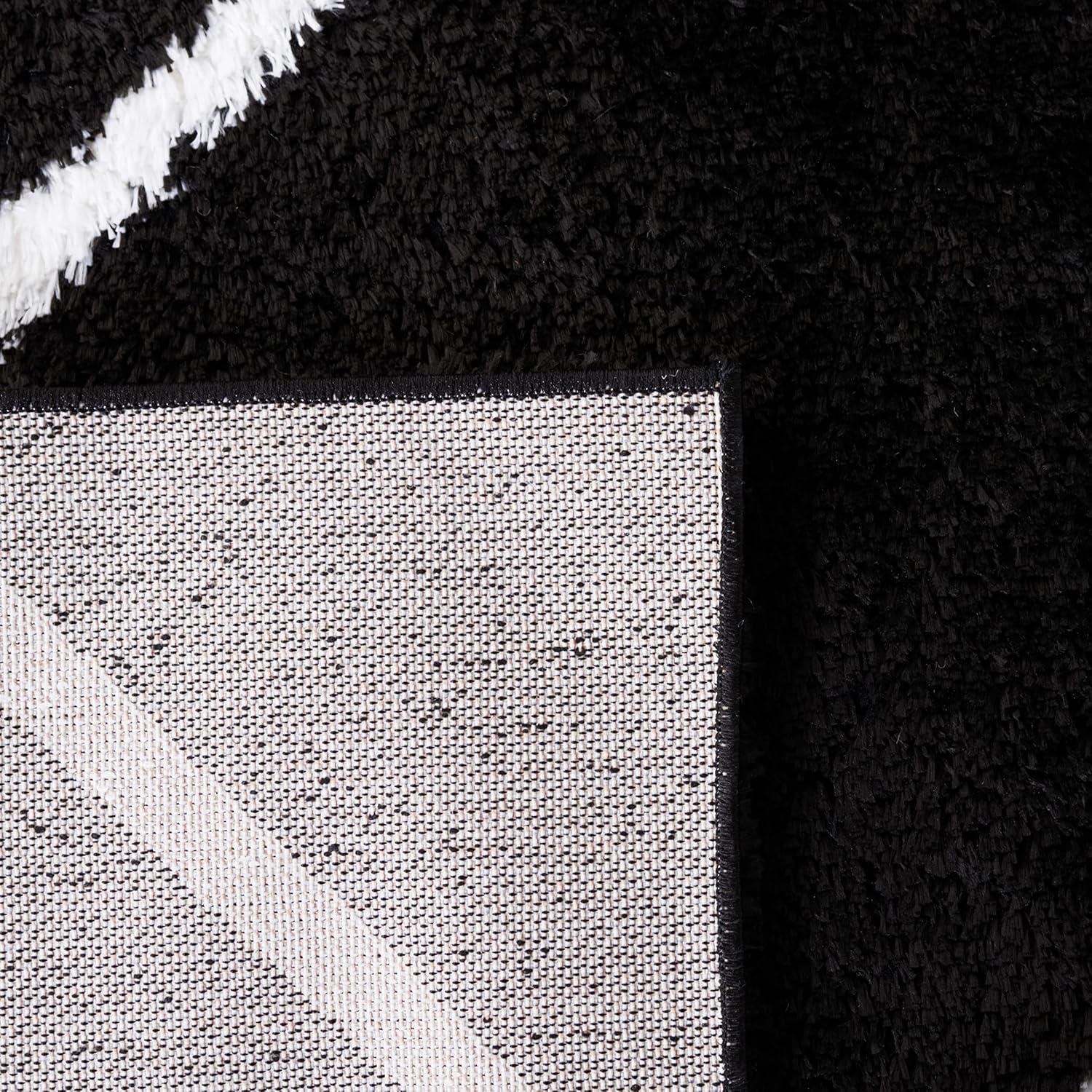 Black and White Geometric Shag 9' x 12' Synthetic Area Rug