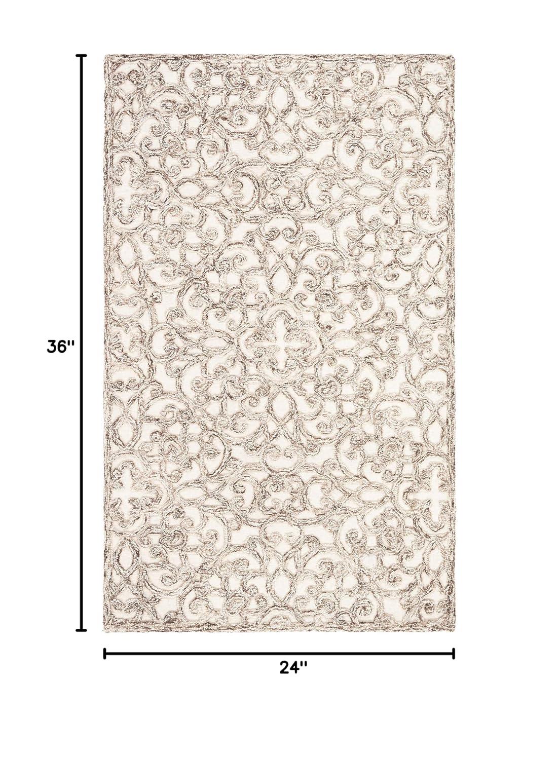 Trace TRC103 Hand Tufted Indoor Accent Rug - Brown/Ivory - 2'x3' - Safavieh