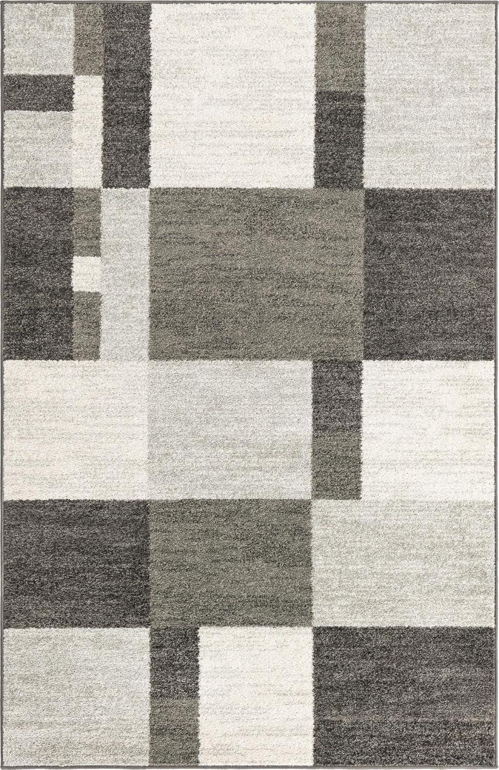 5.25' x 8' Gray and Ivory Checkered Rectangular Area Throw Rug