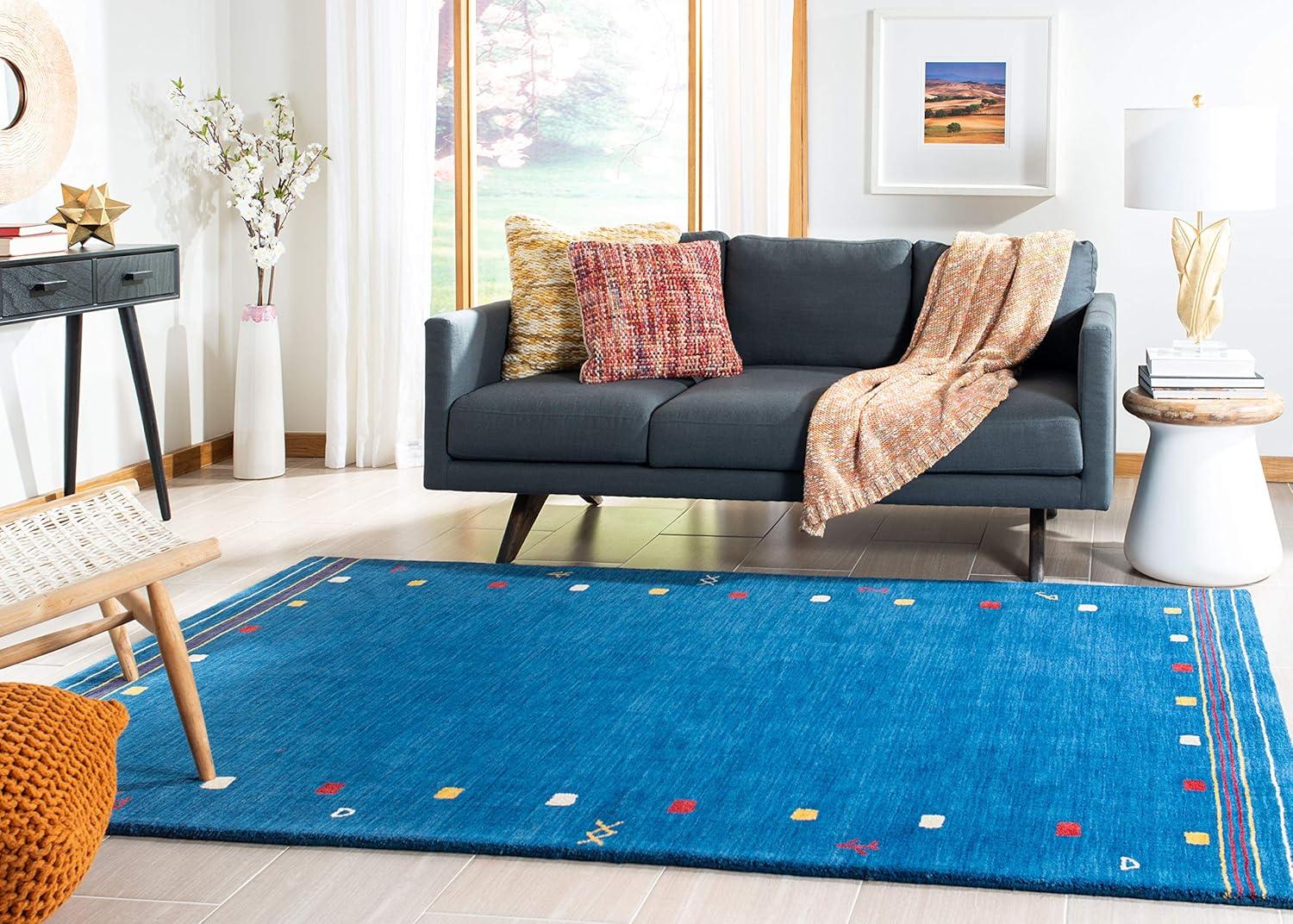 SAFAVIEH Himalaya Charmaine Solid Wool Area Rug, Blue, 6' x 9'
