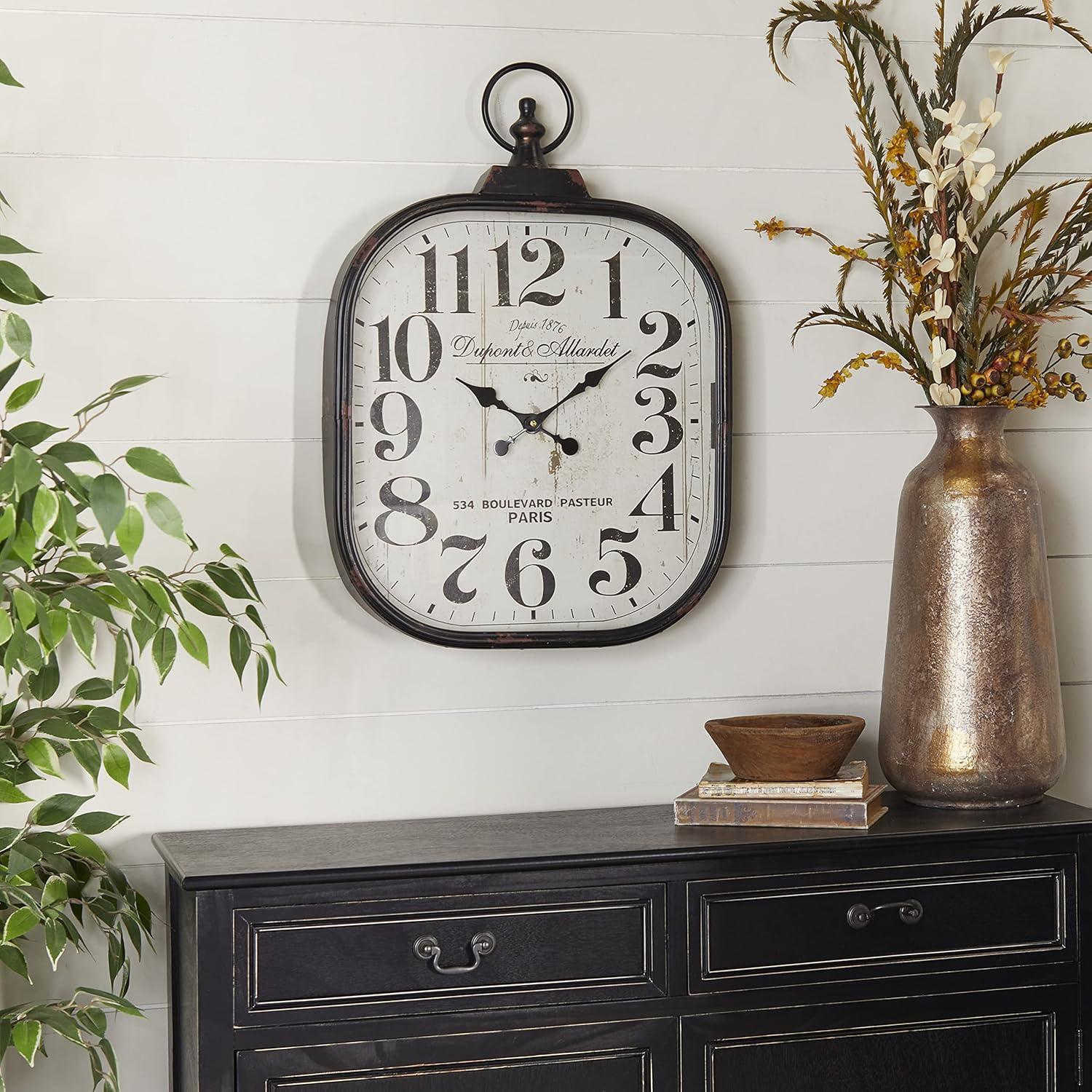 DecMode 18" x 26" Black Metal Distressed Pocket Watch Style Wall Clock with Ring Finial