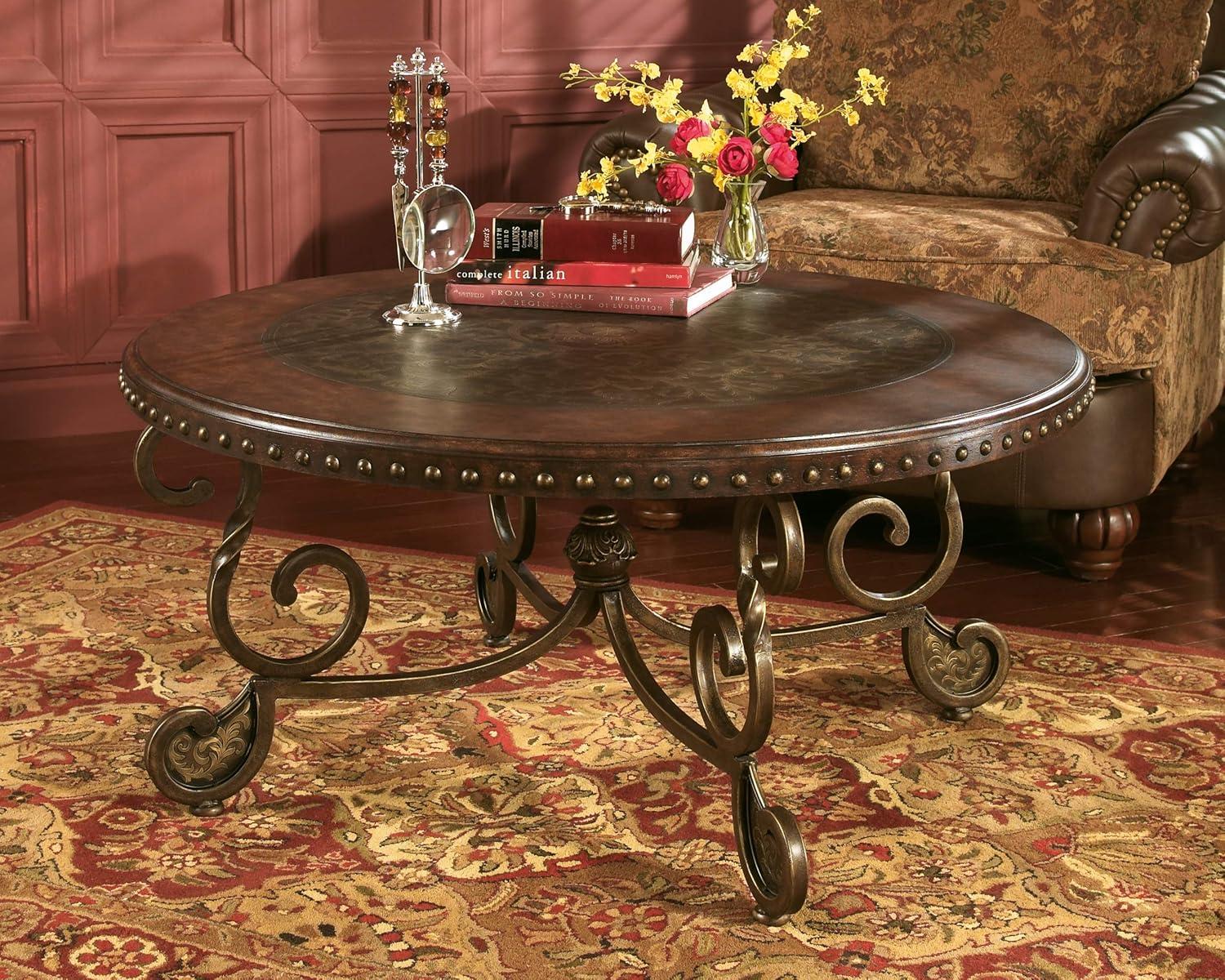 Signature Design by Ashley Rafferty Ornate Round Coffee Tabe with Decorative Metal Detail, Dark Brown