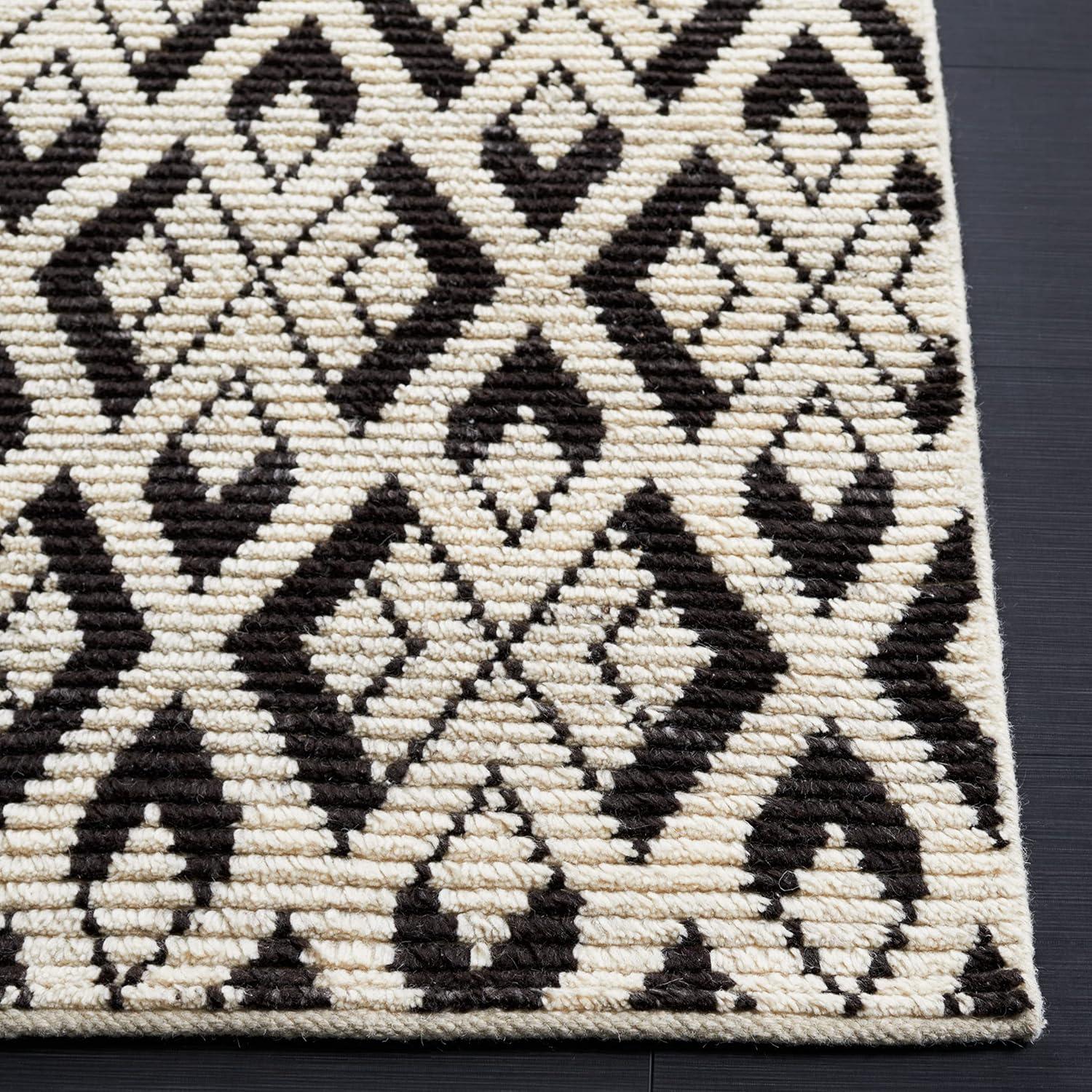 Ivory and Black Hand-Knotted Wool 6' x 9' Area Rug