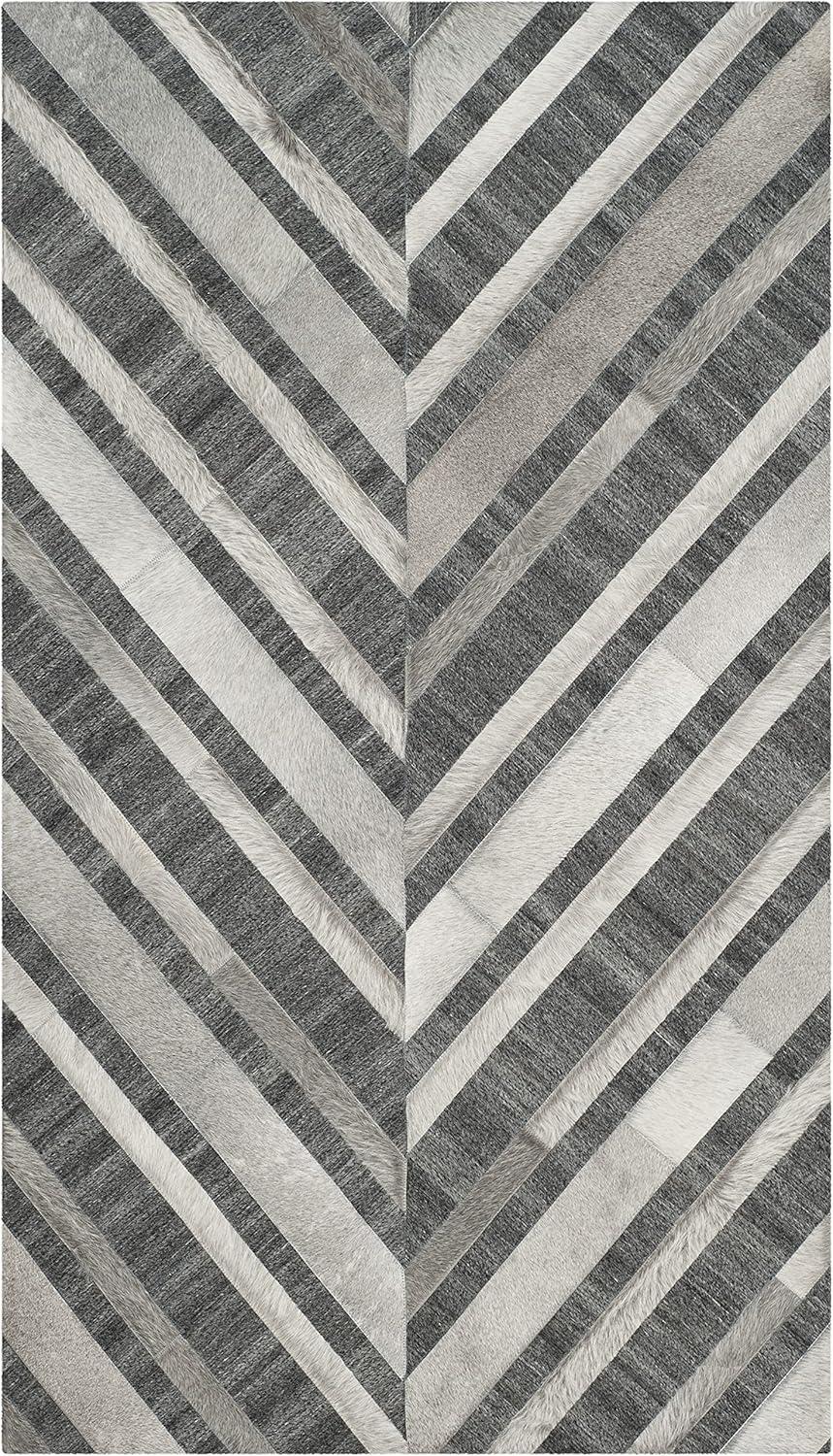 Ivory and Dark Grey Handmade Geometric Cowhide Area Rug