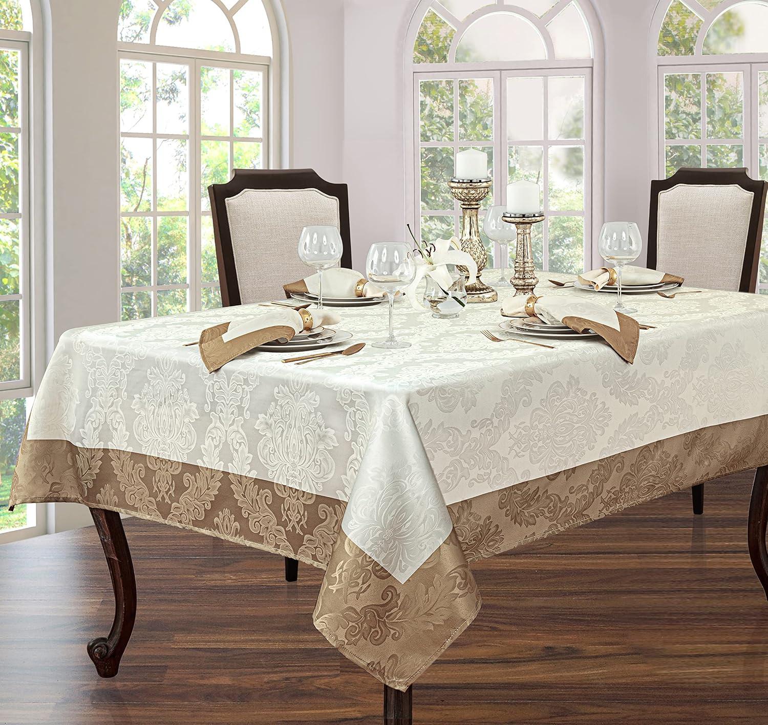 Newbridge Valencia Two Tone Bordered Damask Fabric Tablecloth, Wrinkle and Stain Resistant Fine Dining Holiday Hotel Quality Tablecloth, 52 Inch x 70 Inch Oblong/Rectangle, Antique Ivory/Gold