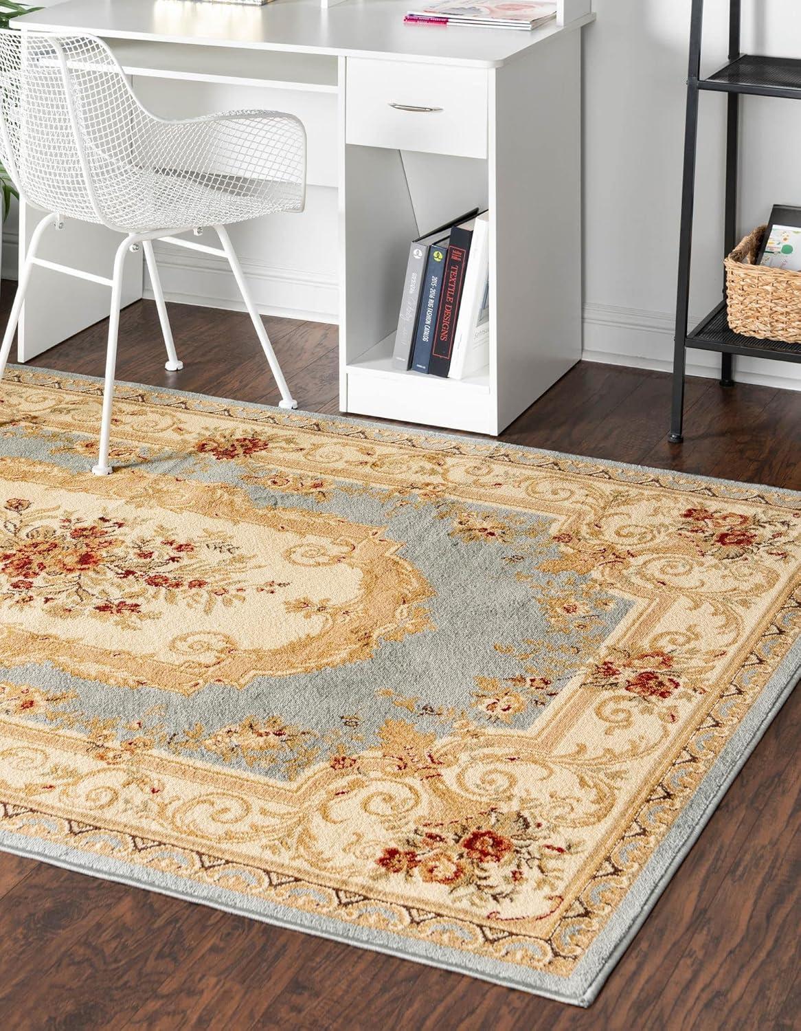 Light Blue and Beige Medallion Synthetic 4' x 6' Area Rug